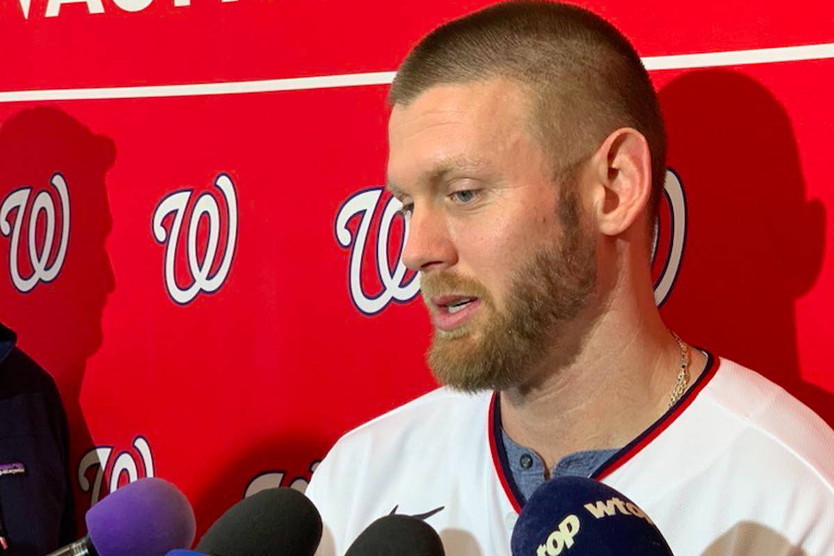 Stephen Strasburg Being Interviewed Red Background Background