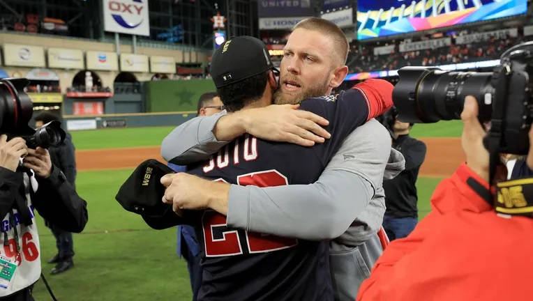 Stephen Strasburg Hugging Teammate Background