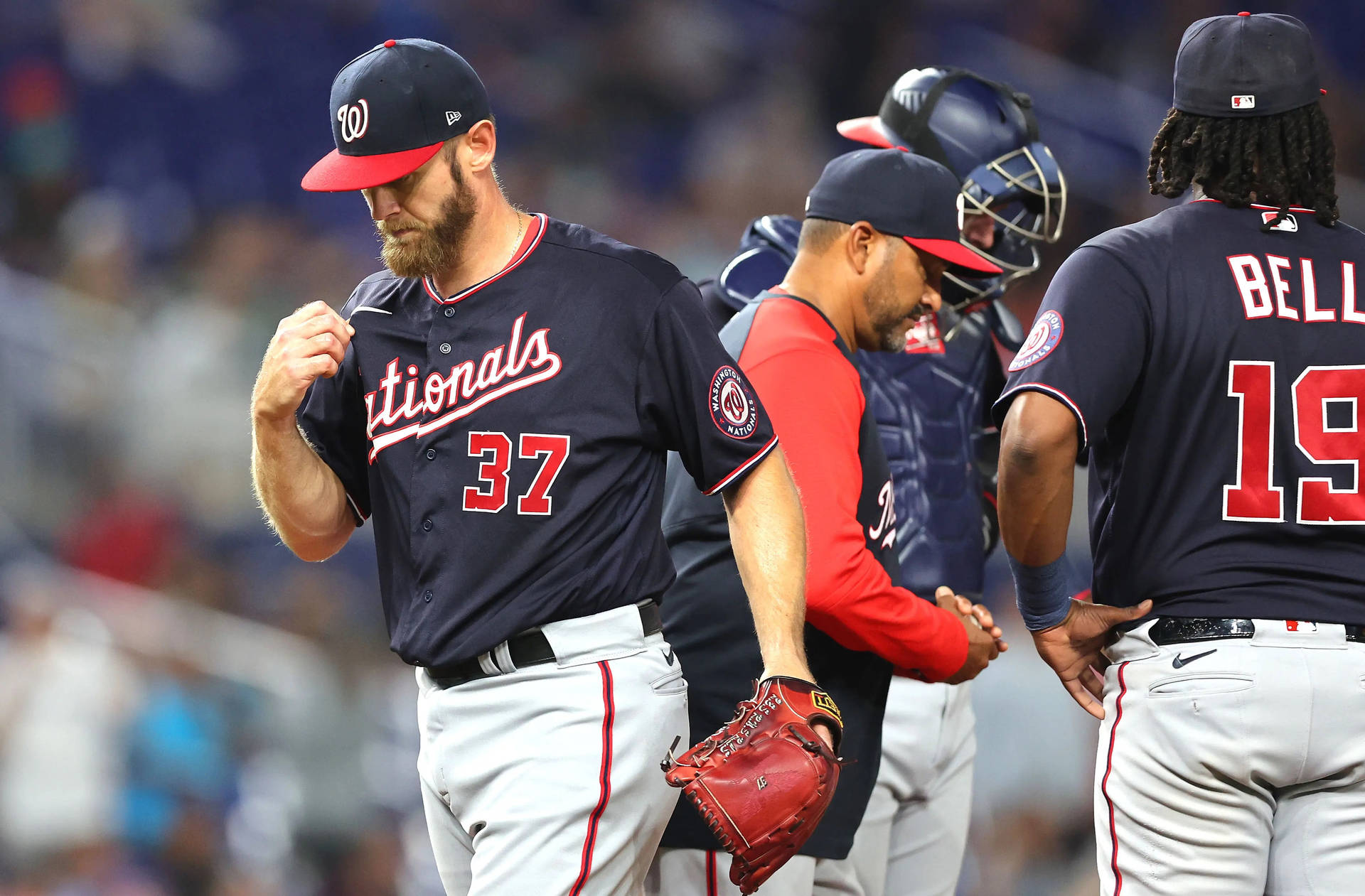 Stephen Strasburg Number 37 Holding His Red Glove Background