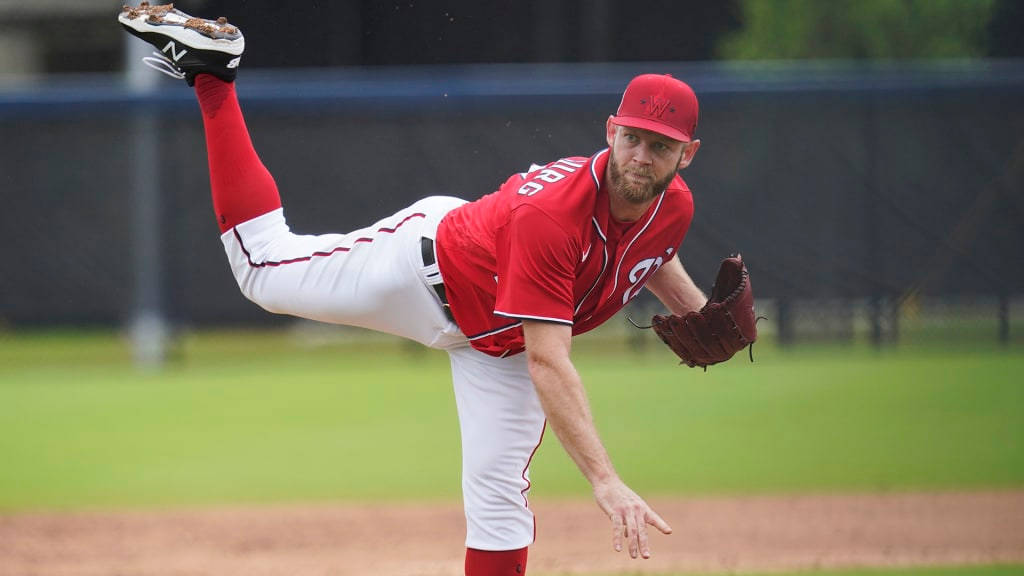 Stephen Strasburg Pitching Right Leg Lifted Background