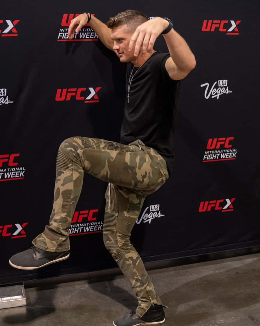 Stephen Thompson Preparing For A Fight In The Ring. Background