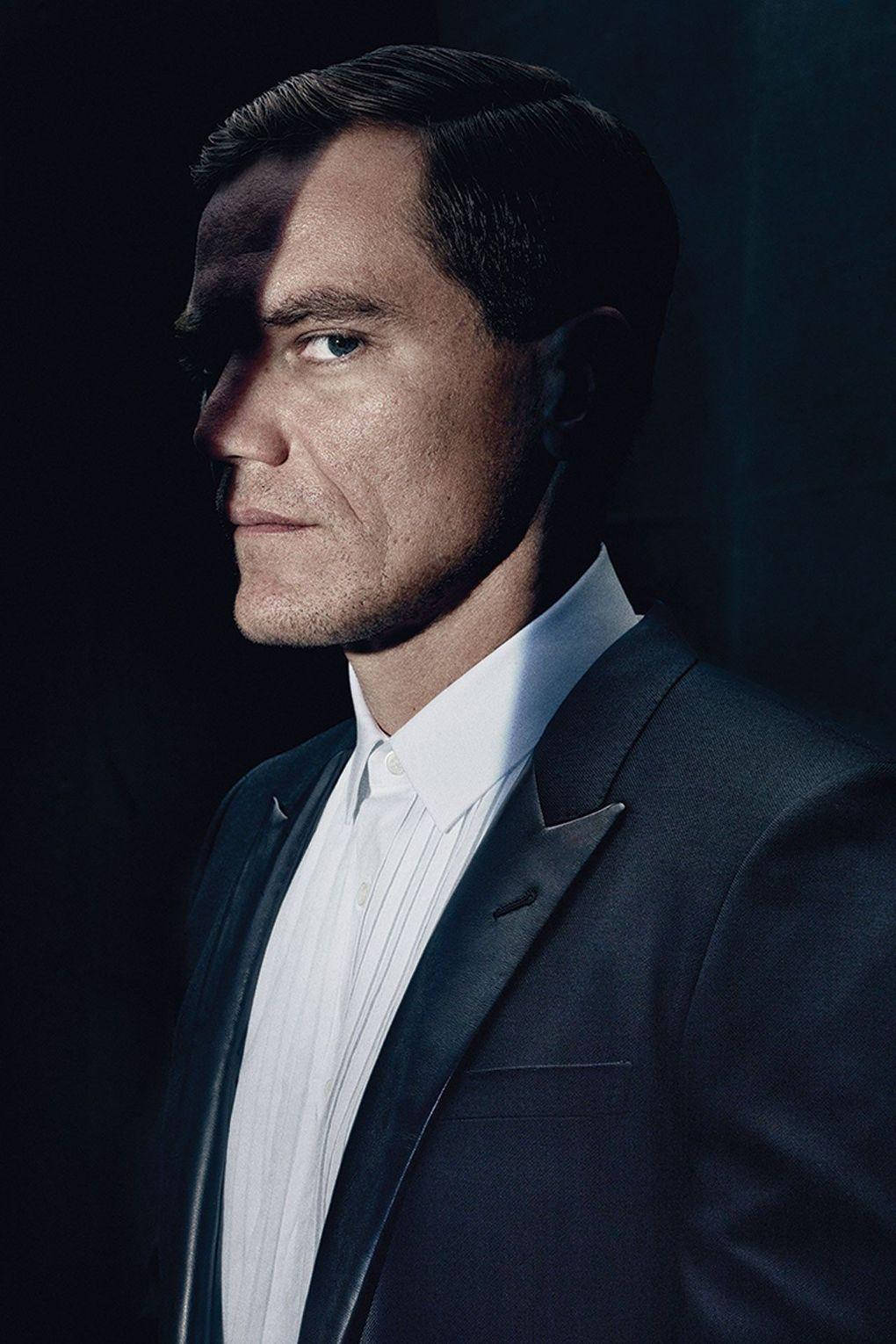 Stern Intensity - A Side View Portrait Of Michael Shannon Background