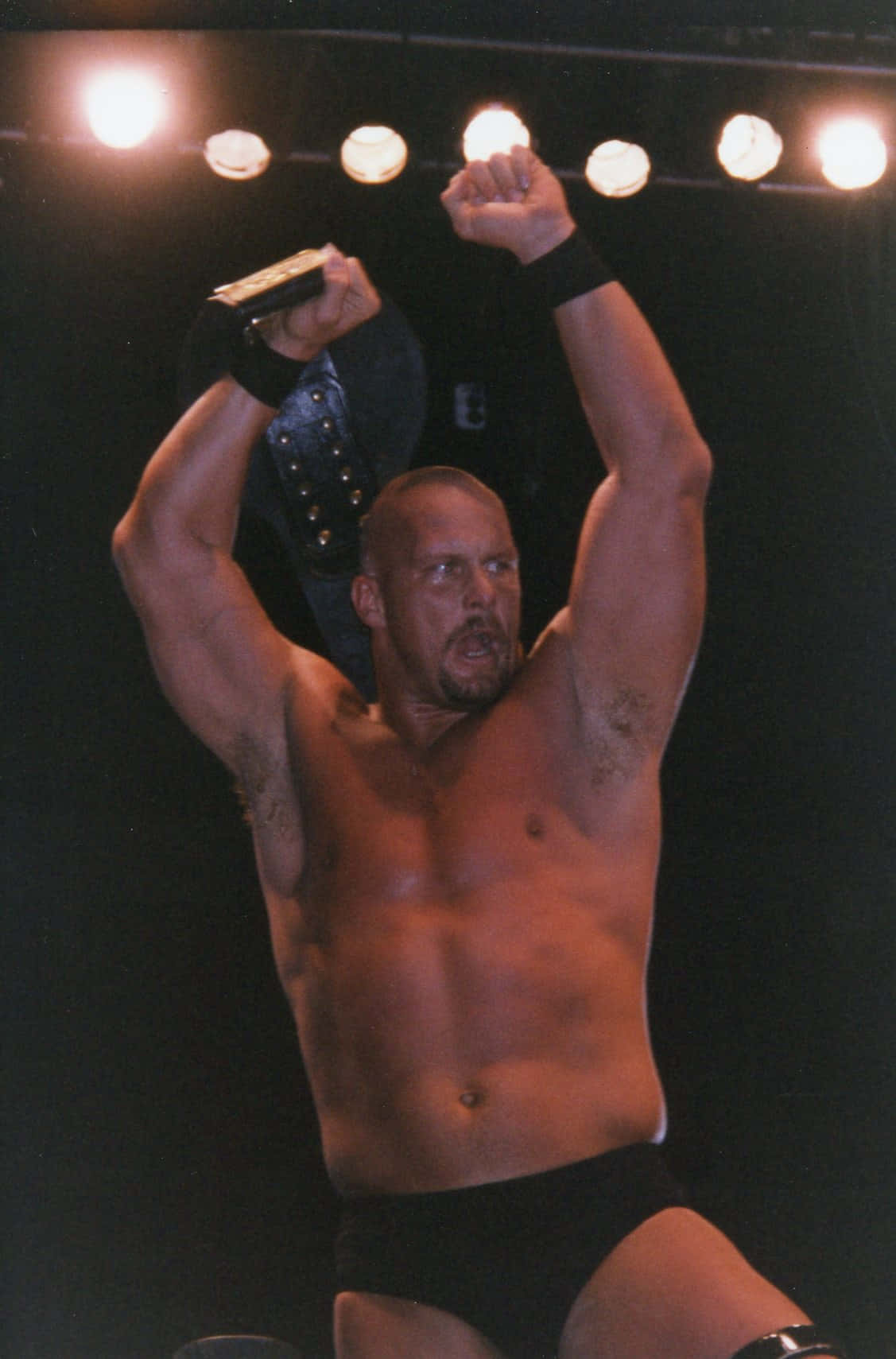 Steve Austin Flexing Muscles Background