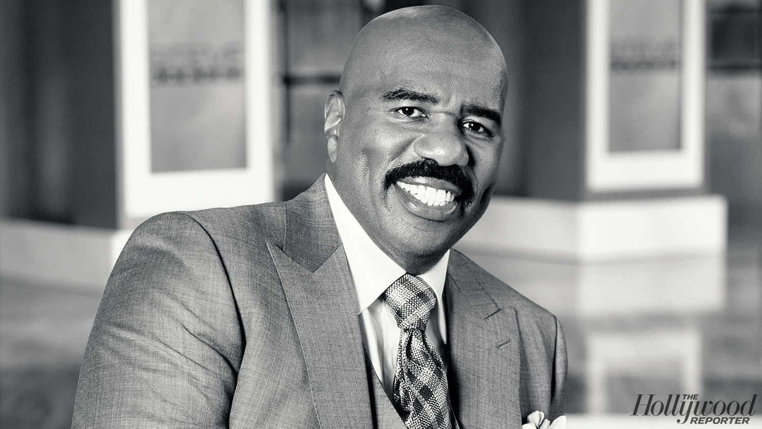 Steve Harvey Delivering A Powerful Speech On Success. Background