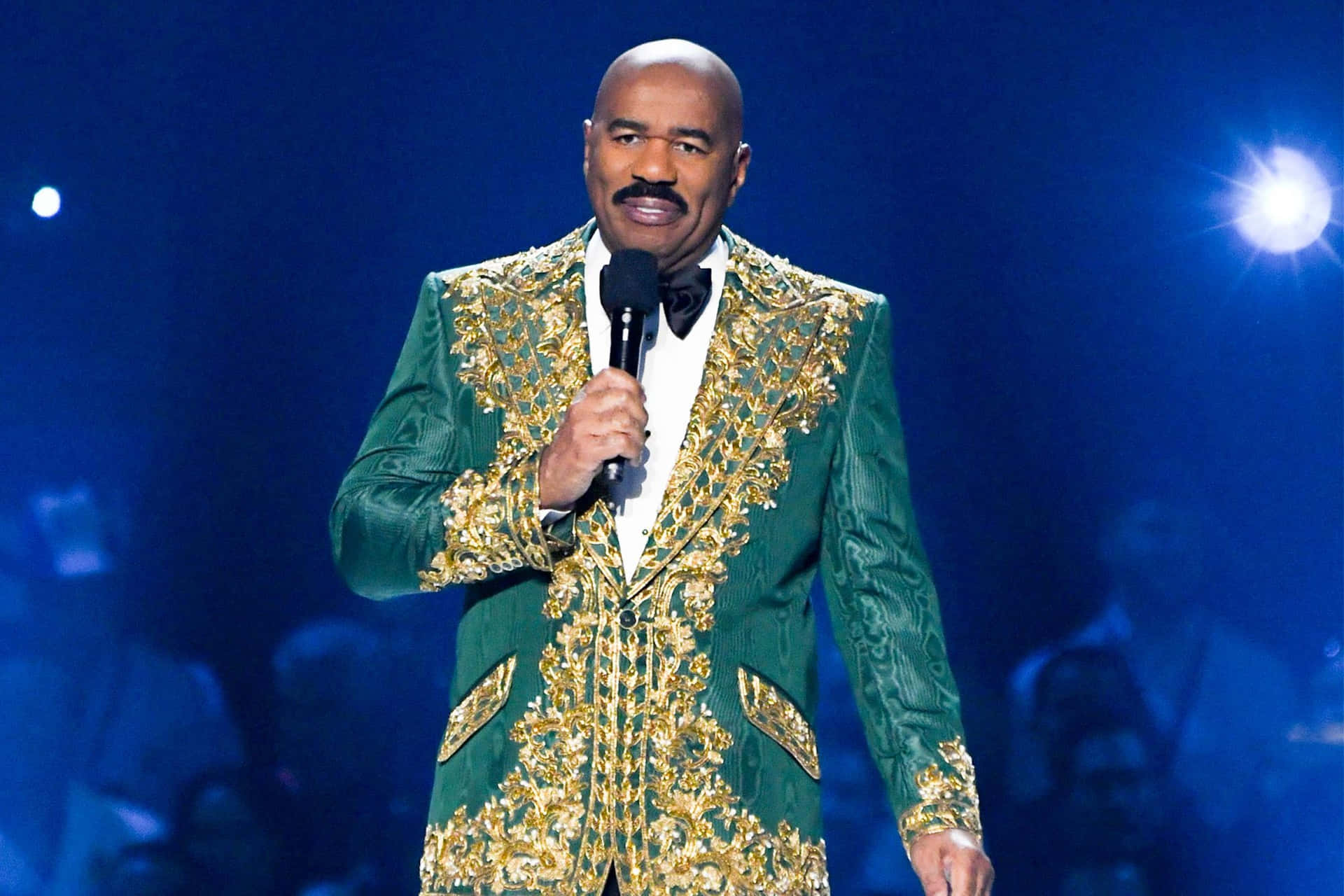 Steve Harvey Hosting In Green And Gold Suit