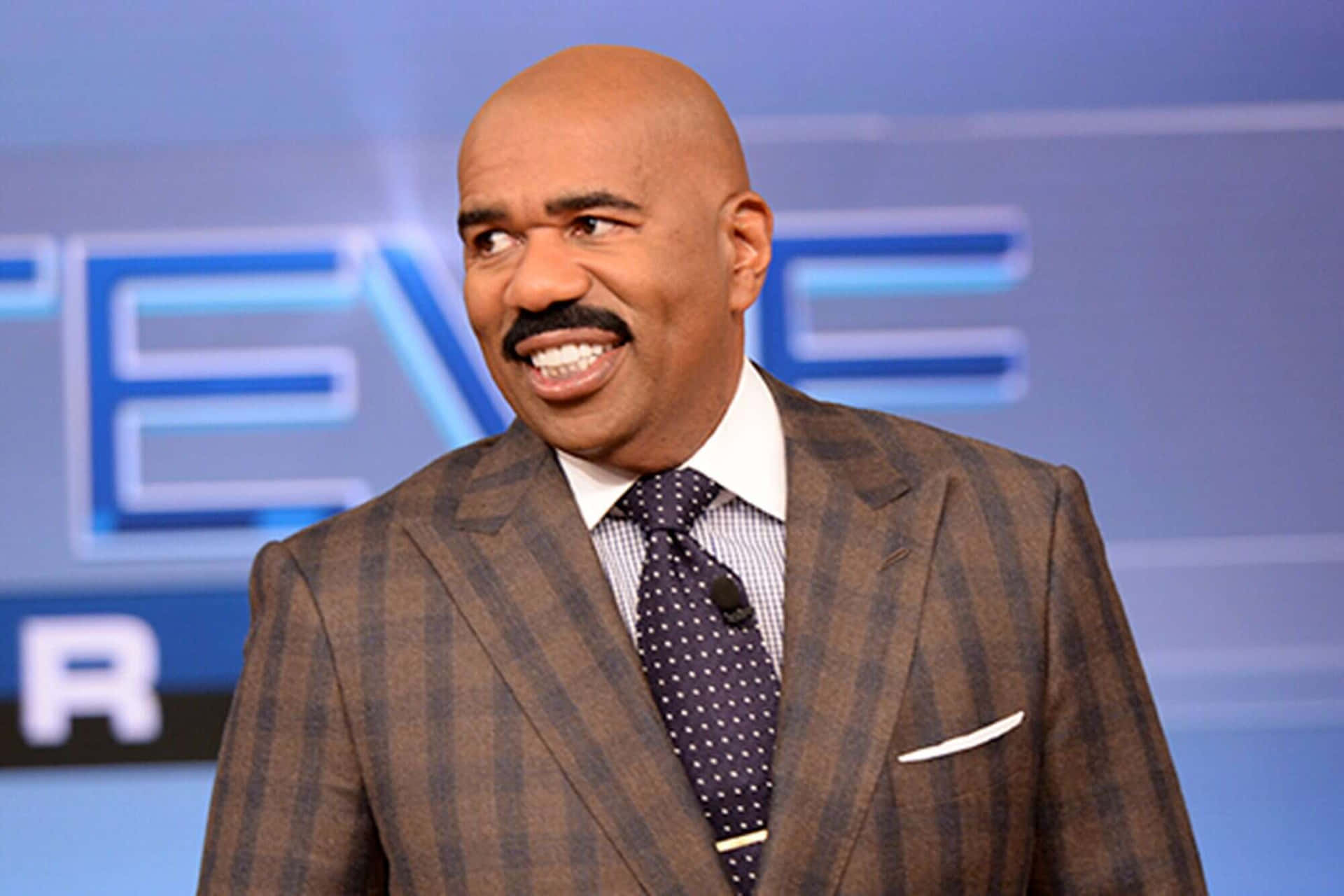 Steve Harvey Smiling And Looking Left