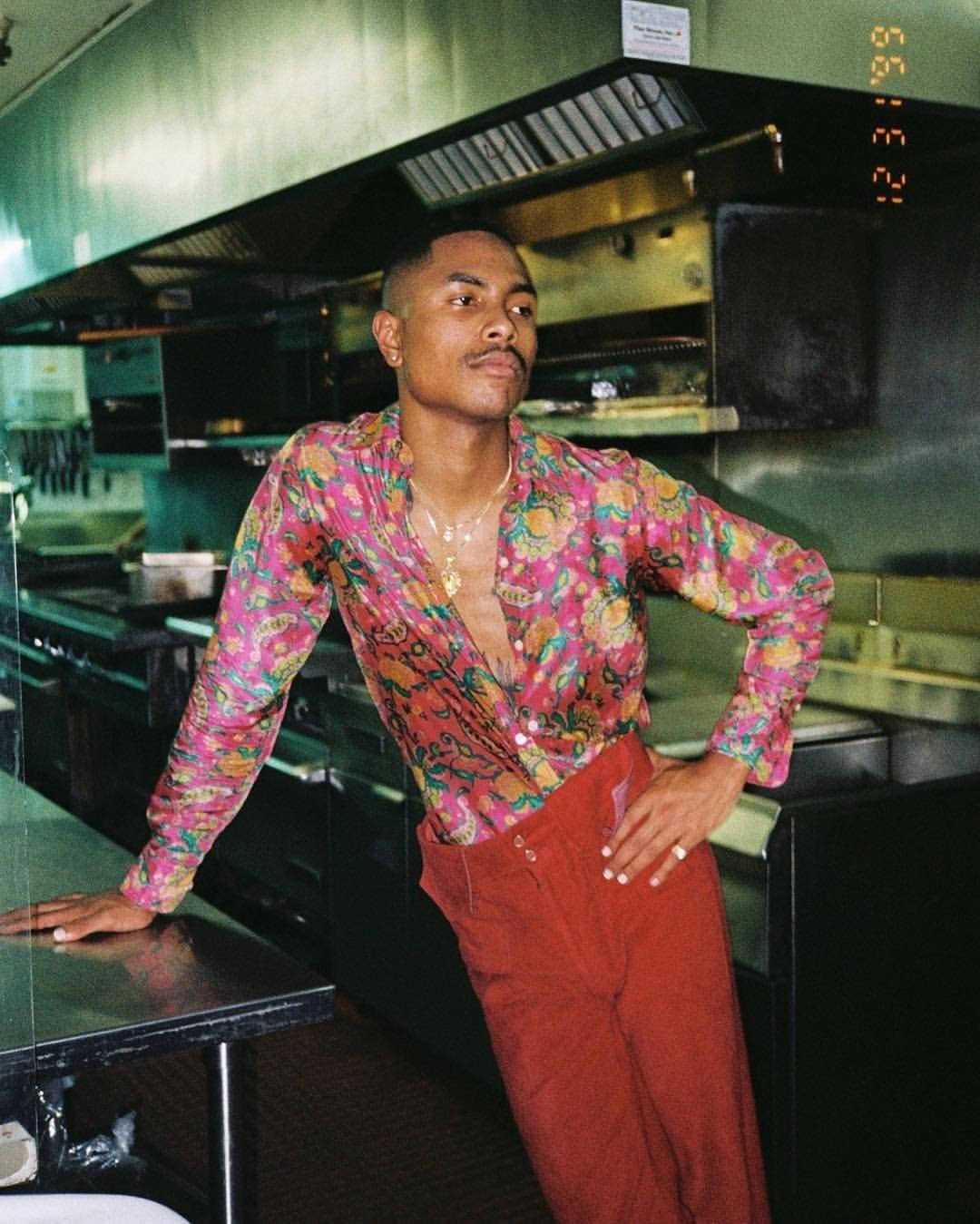 Steve Lacy In Retro Style Outfit Background