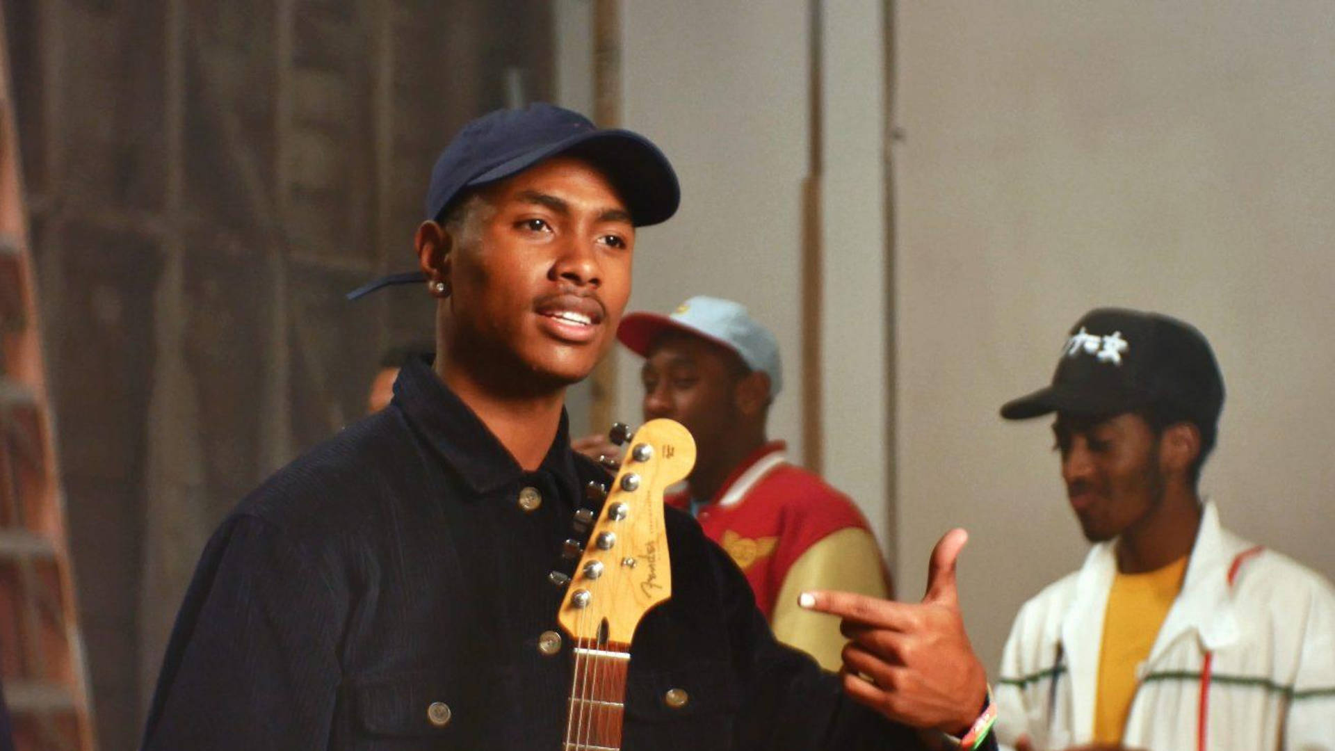 Steve Lacy Singing While Holding Guitar Background