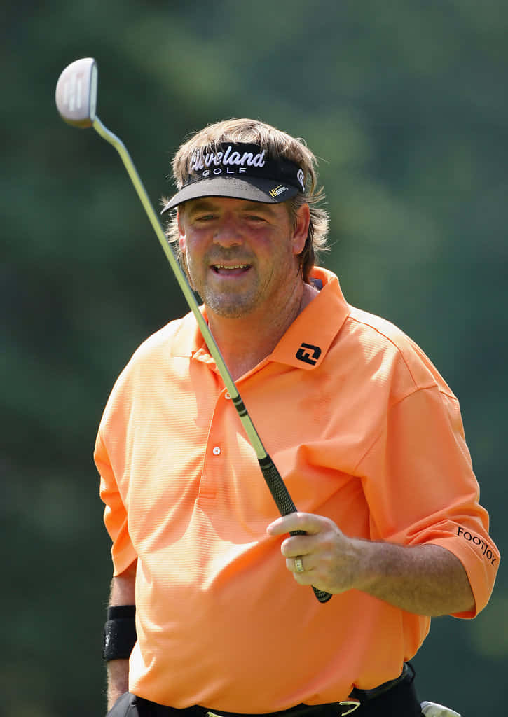 Steve Lowery Donning Bright Orange Shirt Background