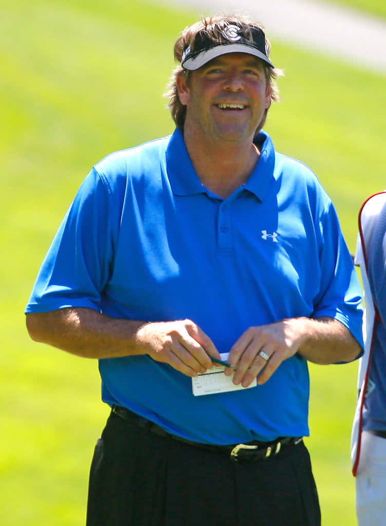 Steve Lowery Holding Golf Scorecard Background