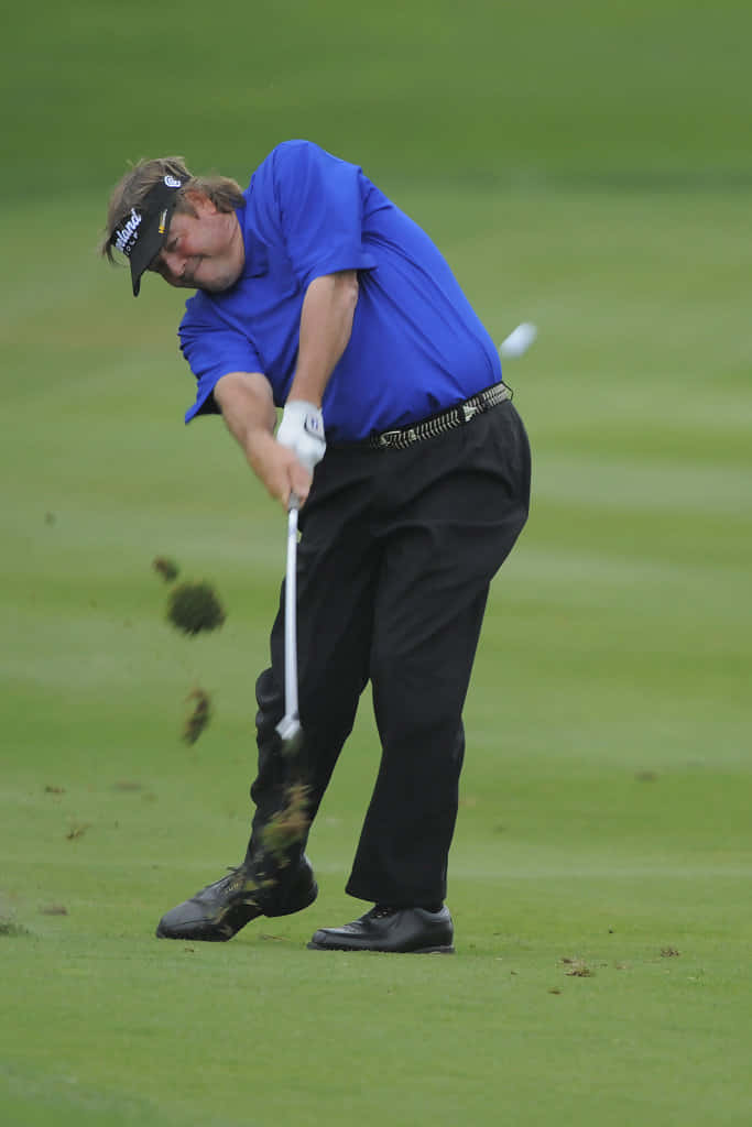 Steve Lowery Taking A Divot Background