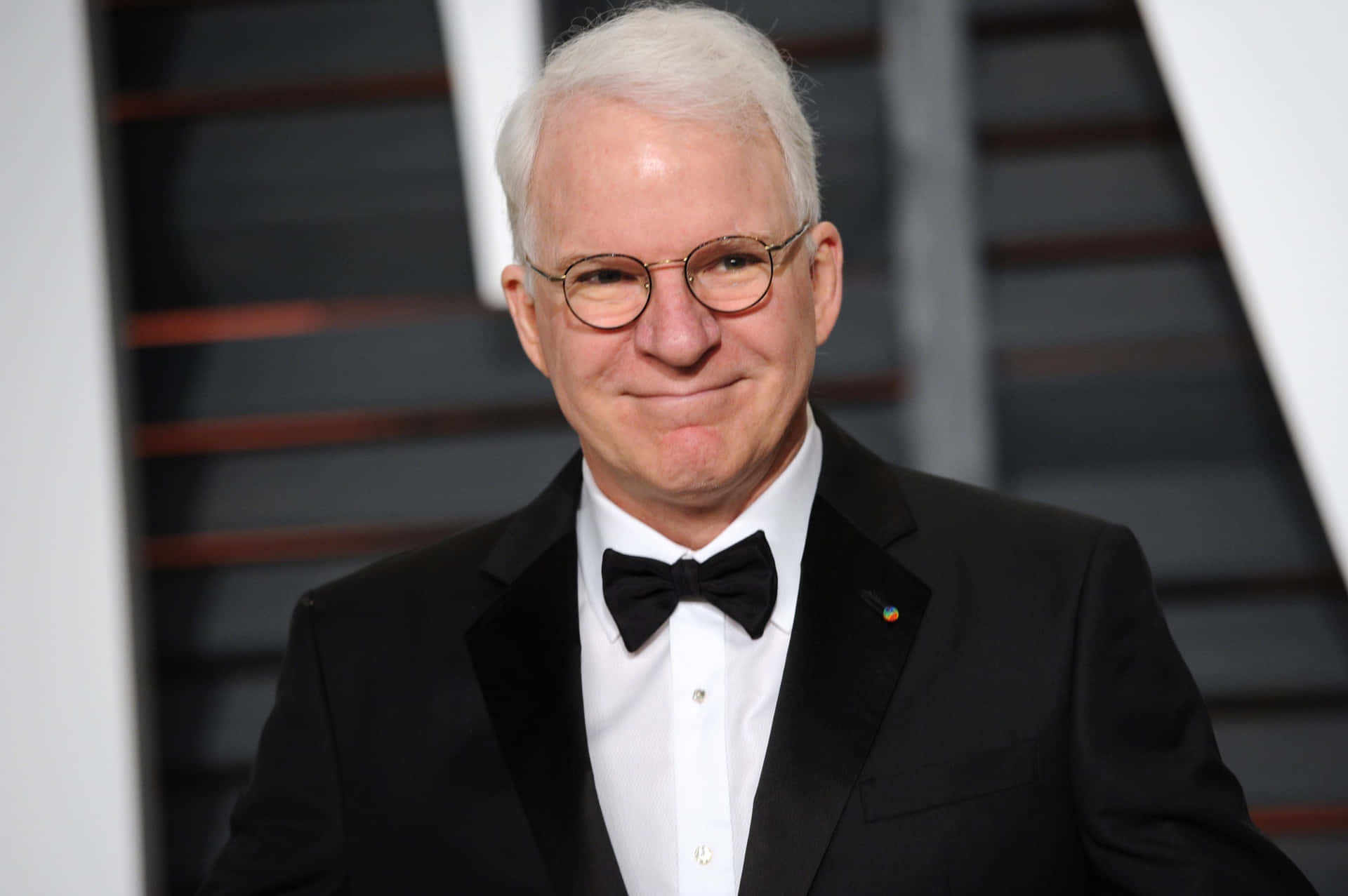 Steve Martin Giving A Classy Pose Background