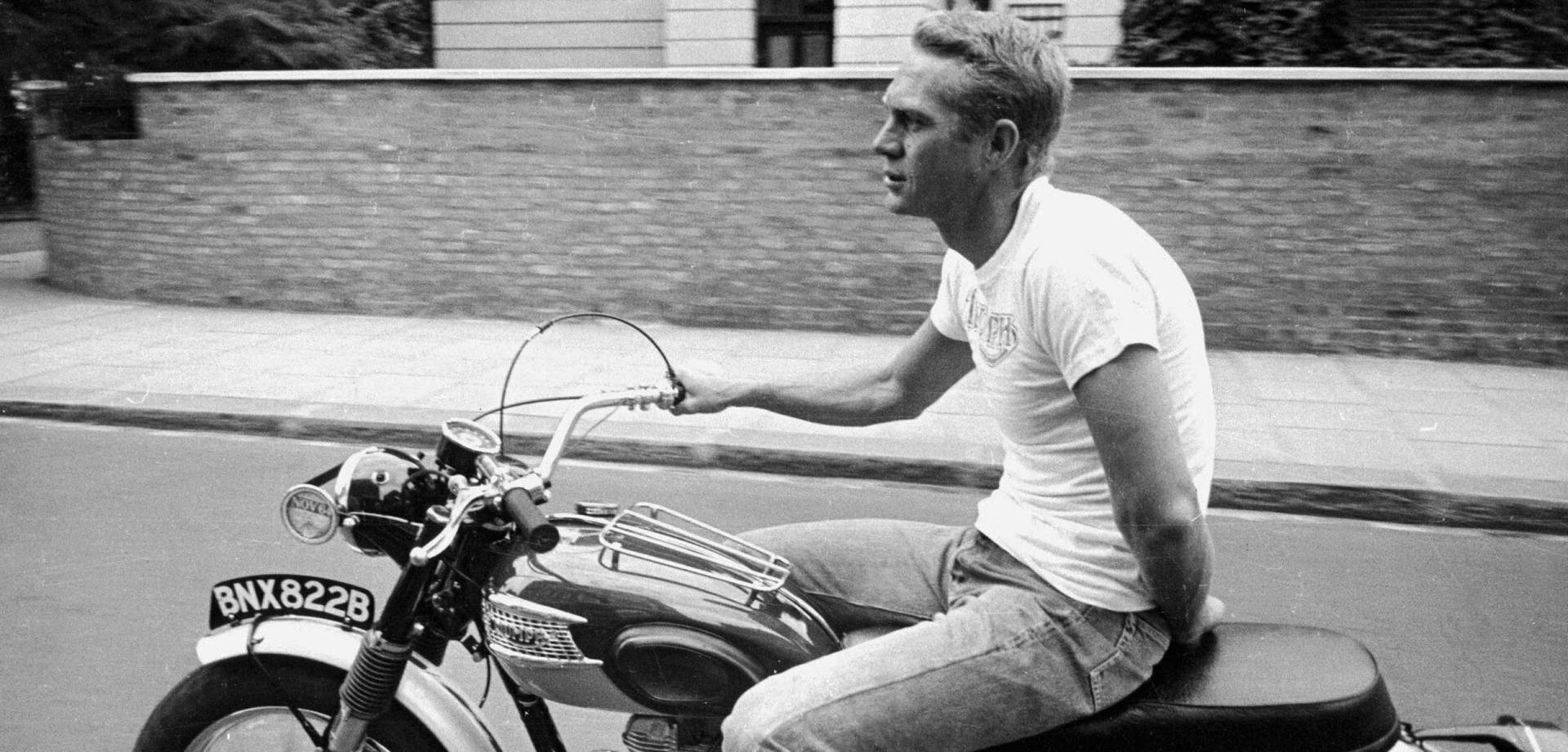 Steve Mcqueen Riding Triumph Motorcycle Background