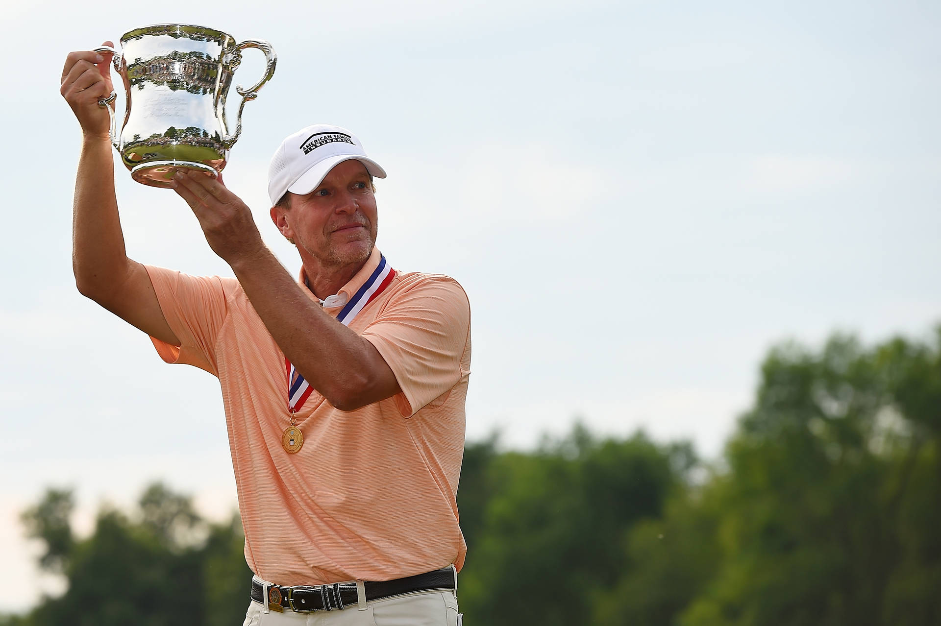 Steve Stricker Raising Silver Trophy