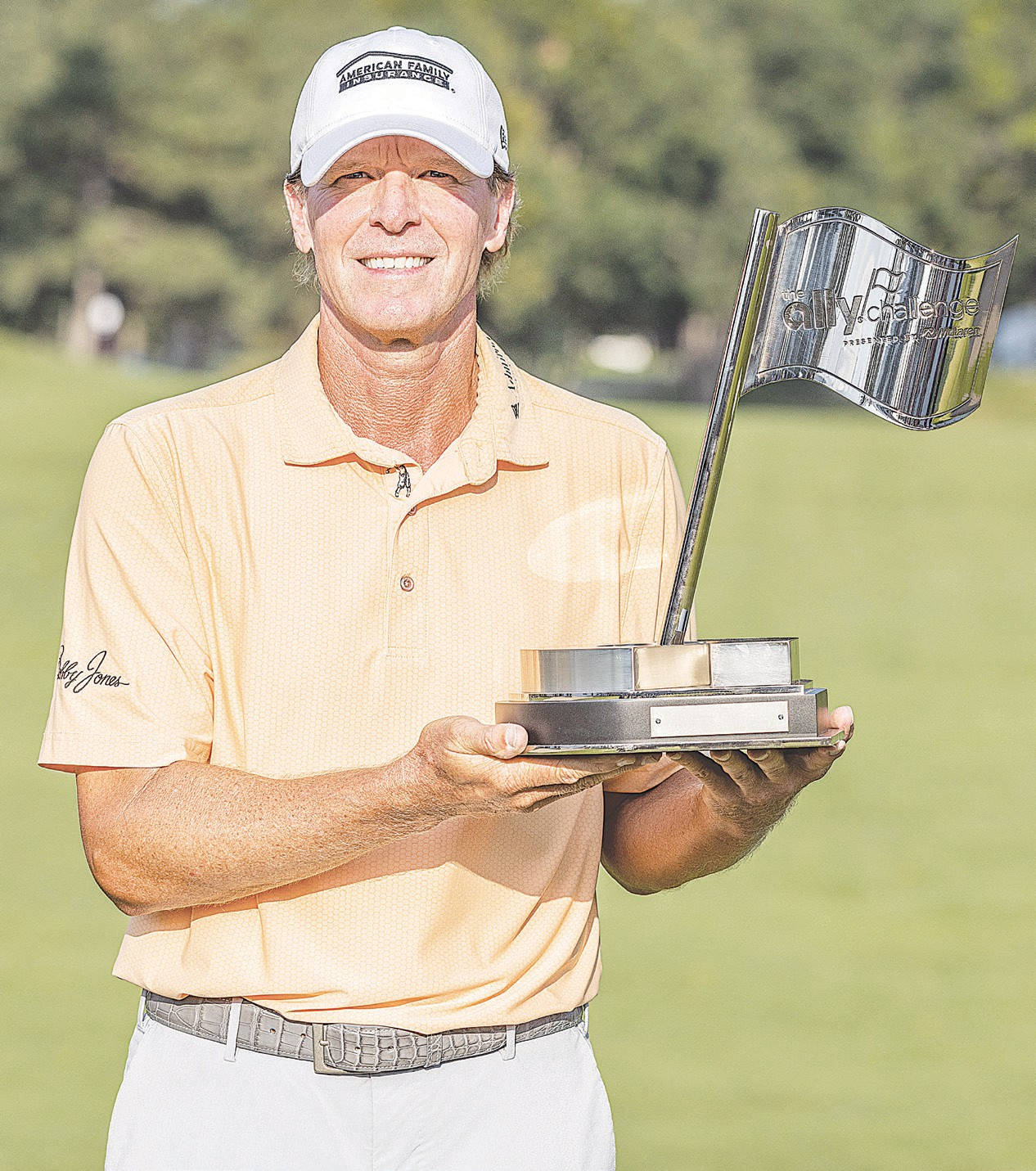 Steve Stricker With A Flag Trophy Background