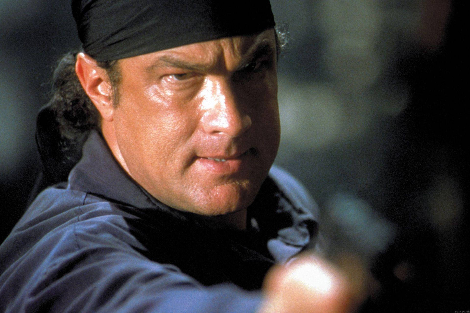 Steven Seagal - An Icon Of Action Cinema Background
