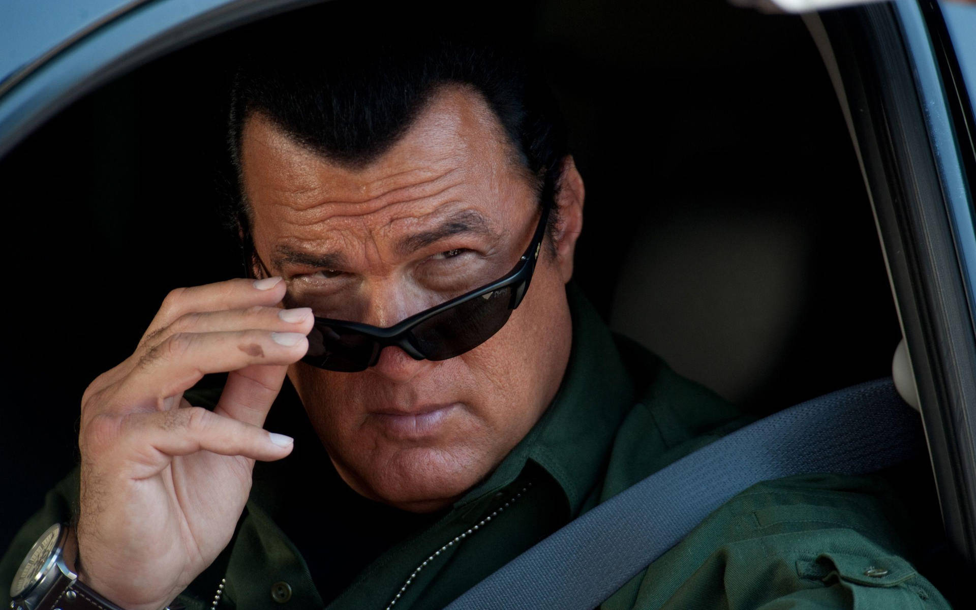 Steven Seagal In His Role As Reserve Deputy Chief Background