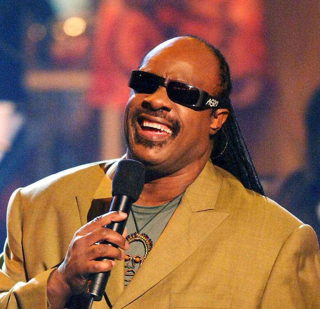 Stevie Wonder Holding Microphone Background