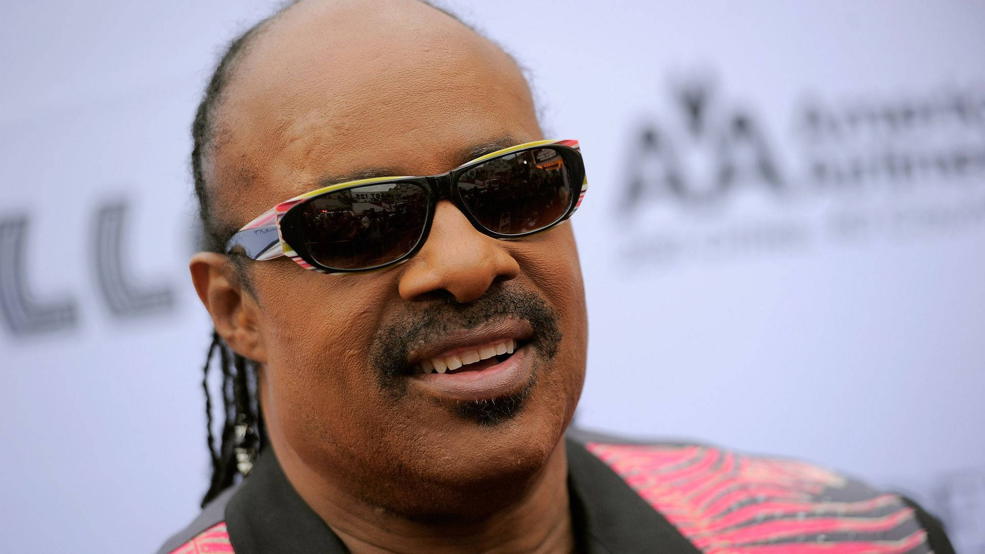 Stevie Wonder Red Carpet Background