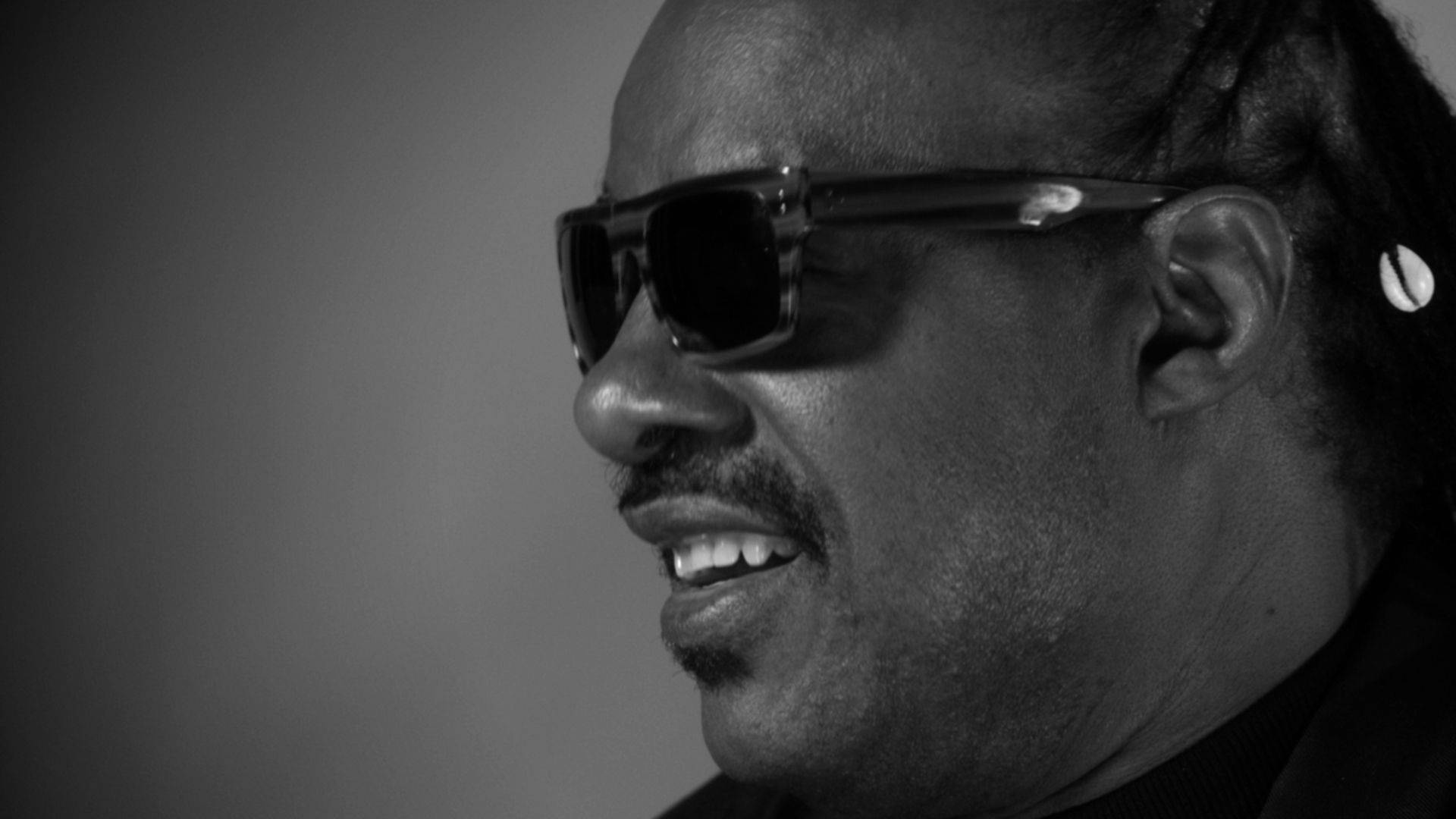 Stevie Wonder Side-profile Shot Background