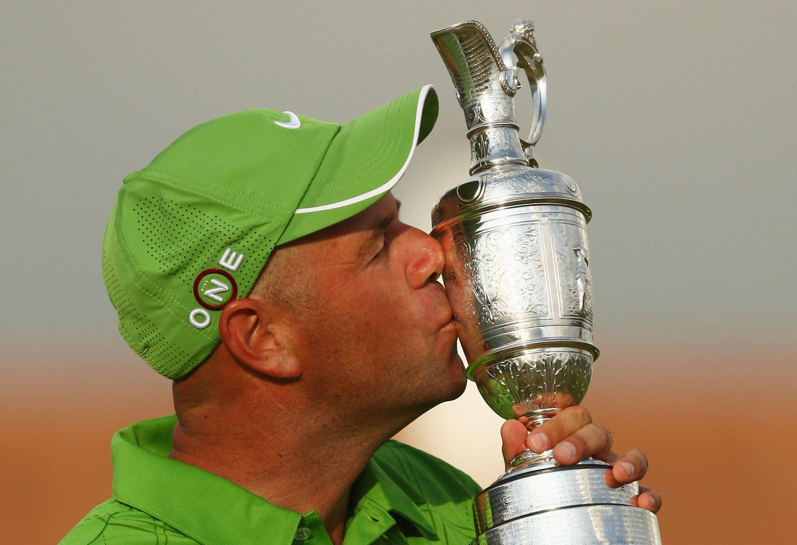 Stewart Cink Kisses Silver Trophy Background