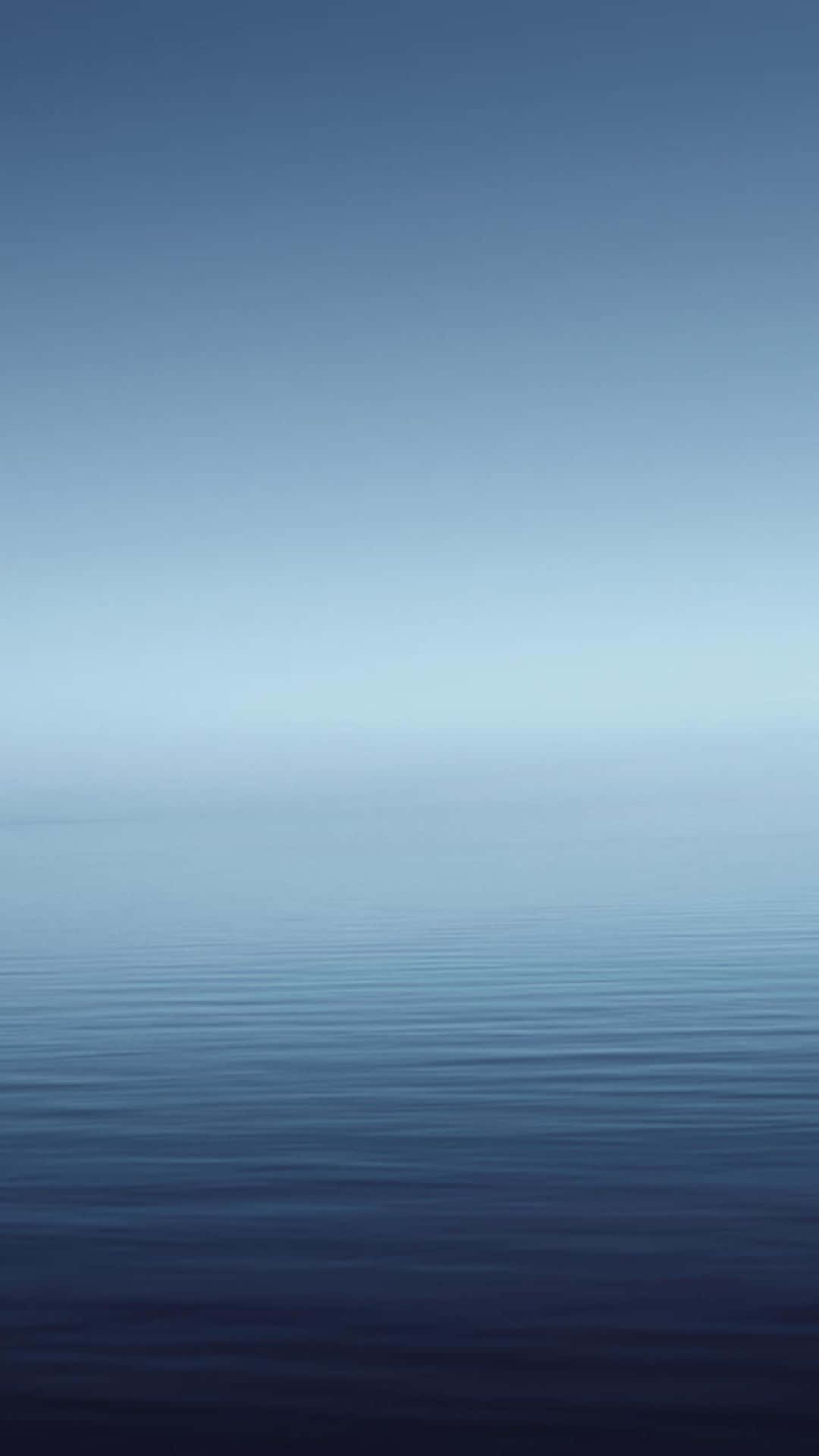 Still Blue Sea And Sky Background