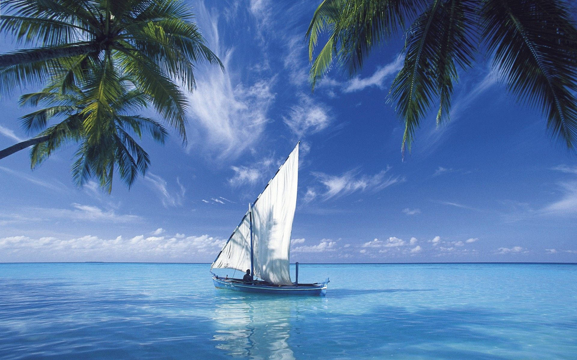 Still Boat On Blue Ocean Background