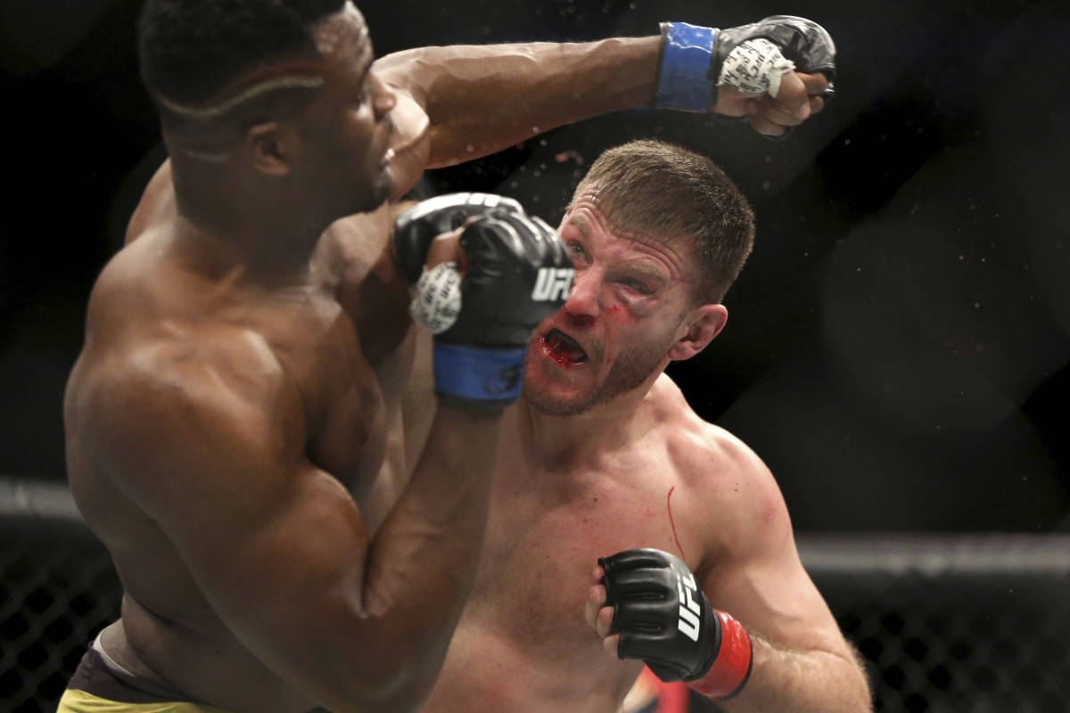 Stipe Miocic Evading Left Hook Background