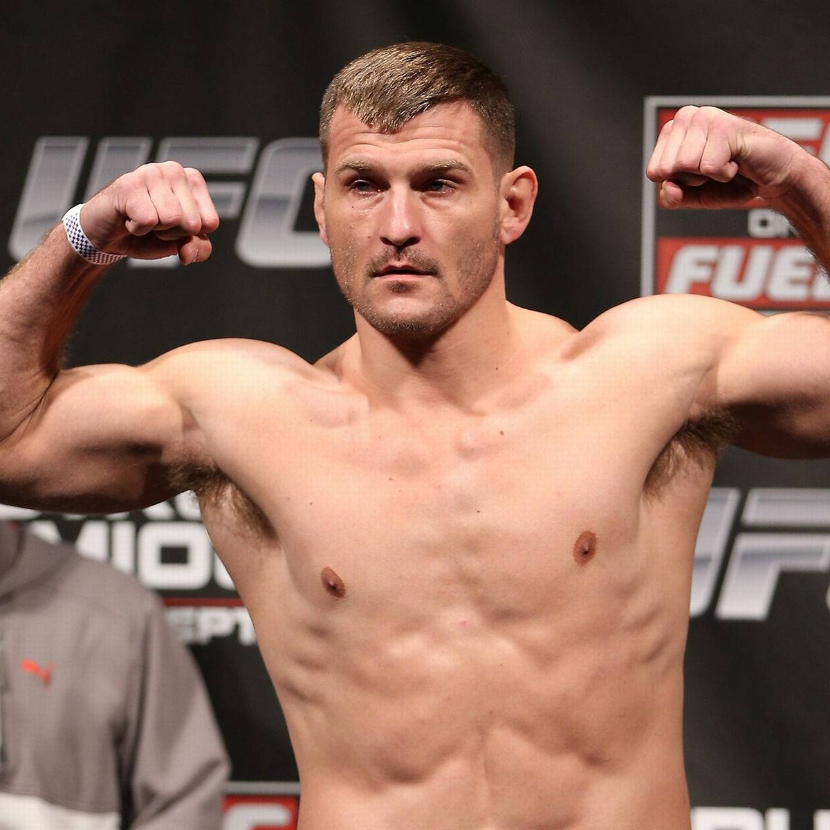 Stipe Miocic Flexing During Weigh-in