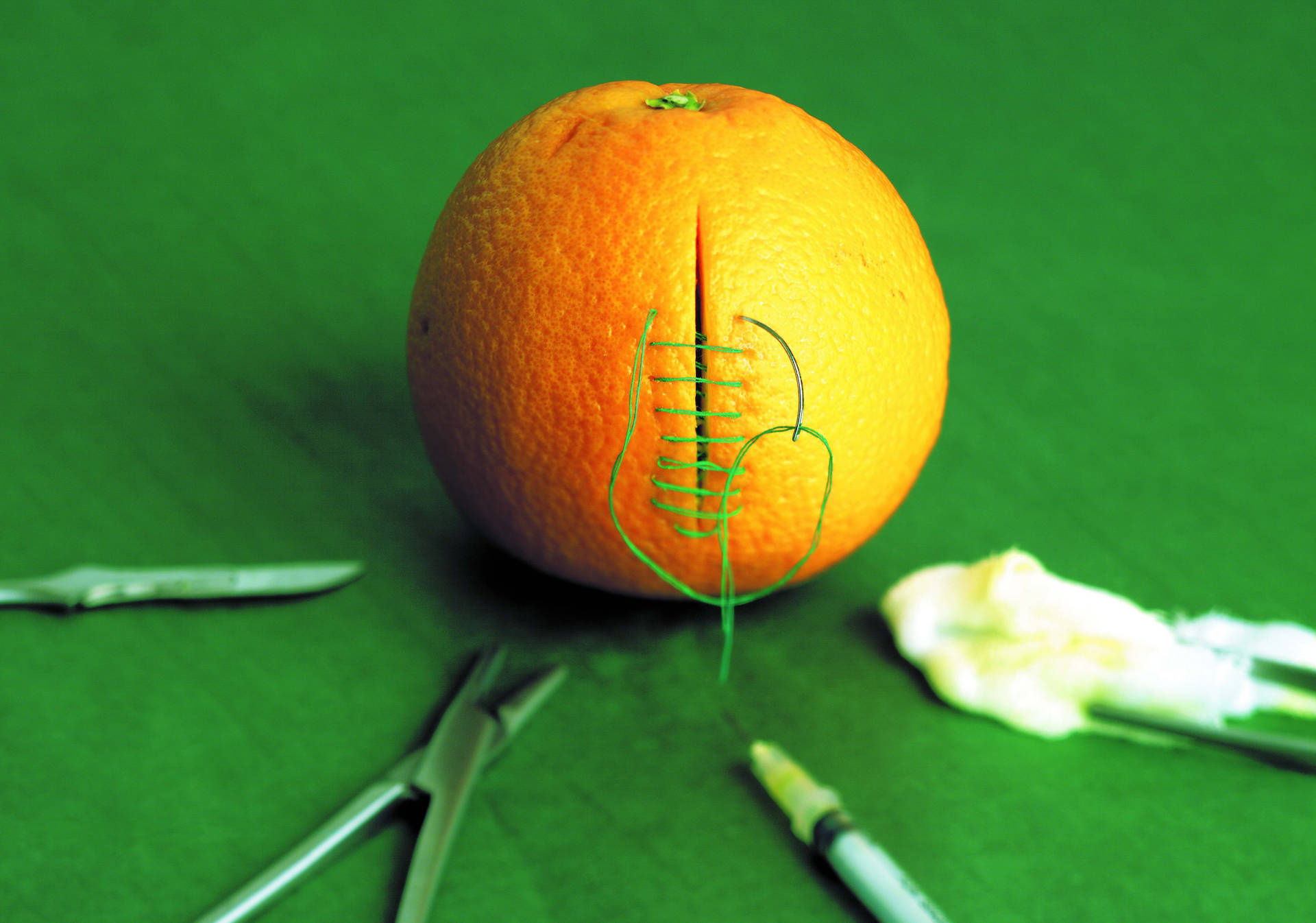 Stitches On Orange Photography Background