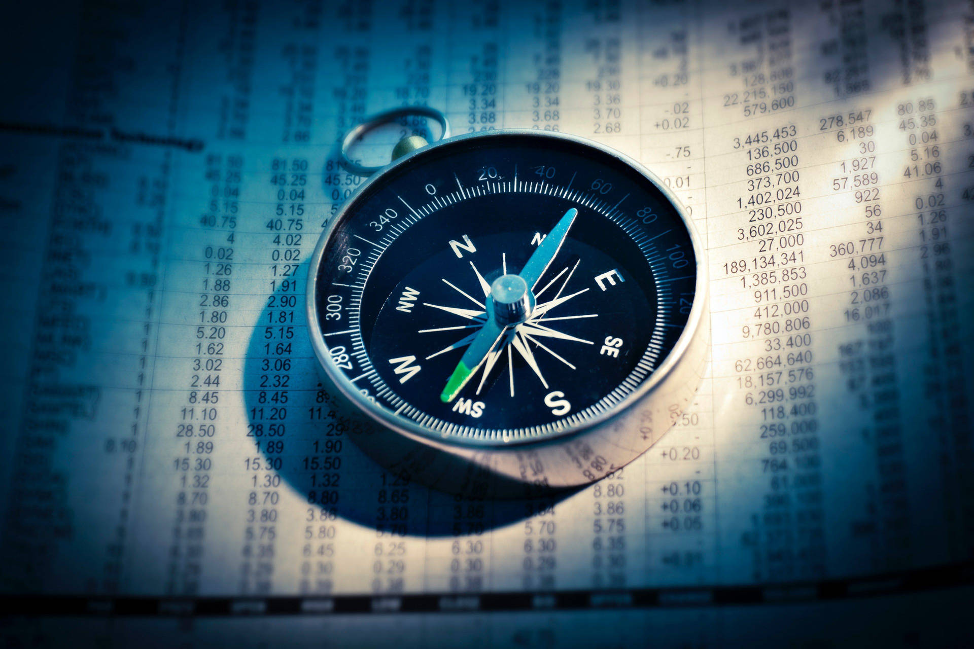 Stock Market Compass On Paper Background