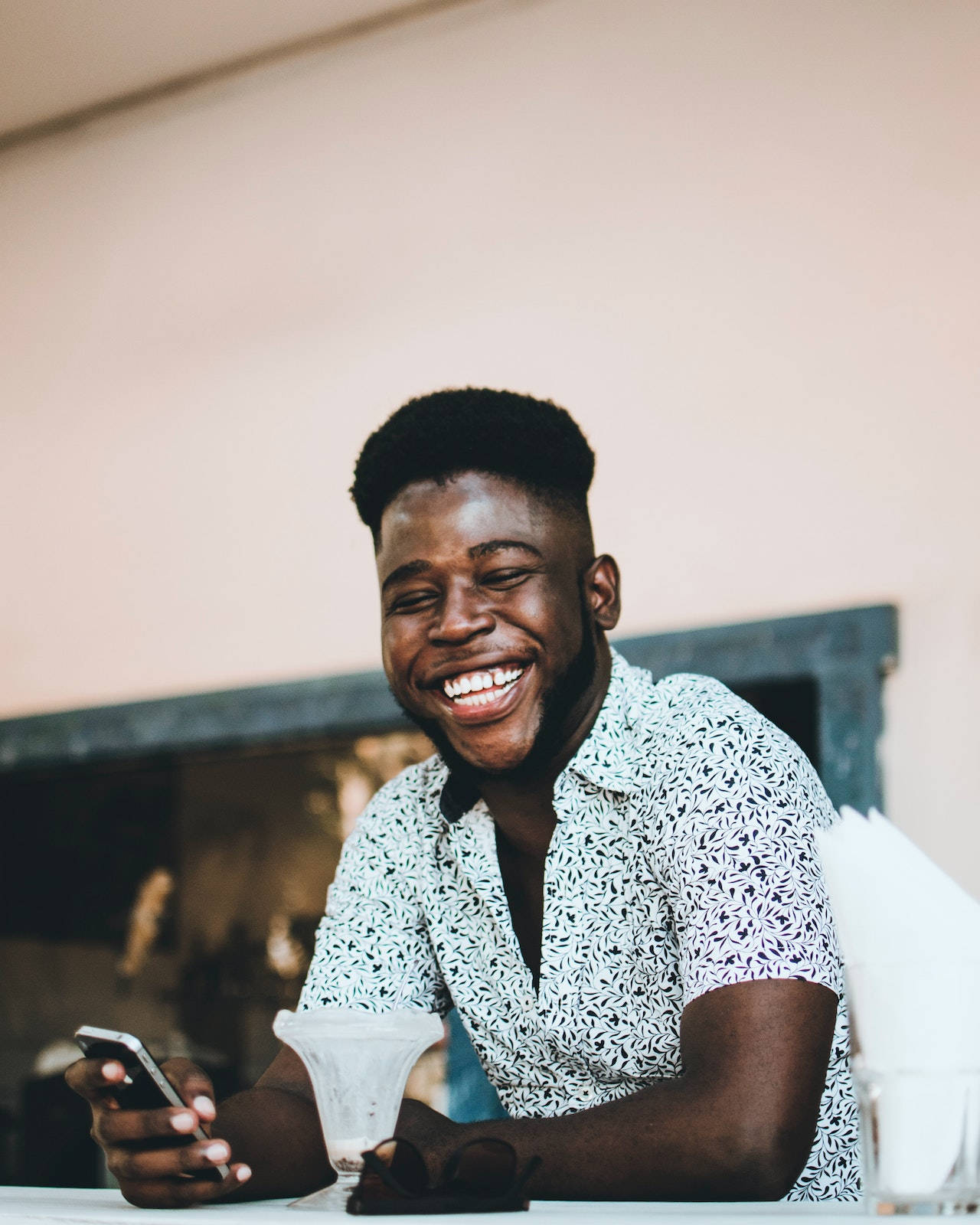 Stolen Shot Of A Smiling Black Man Background