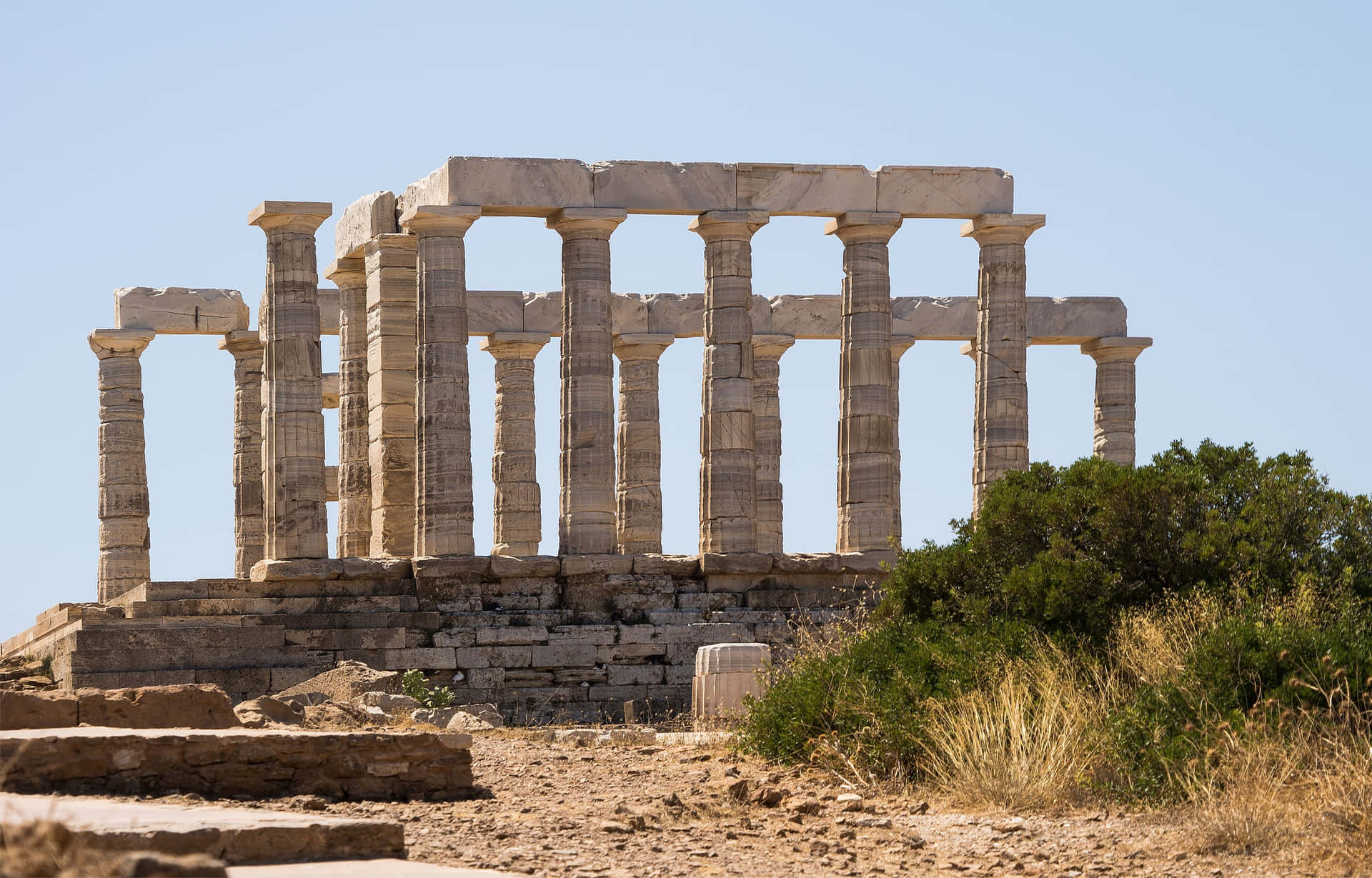 Stone Pillars Temple In Sounion Background