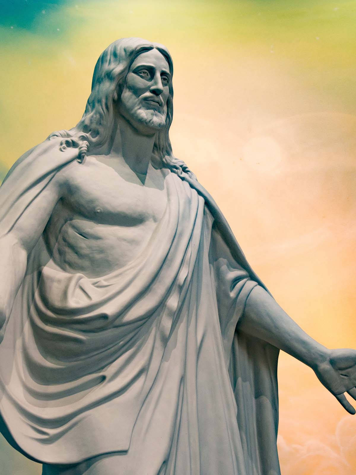 Stone Statue Of Christ Jesus Phone Background