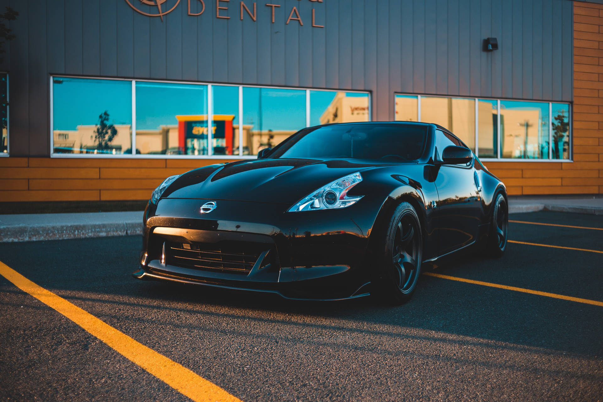 Storefront With Black Sports Cars