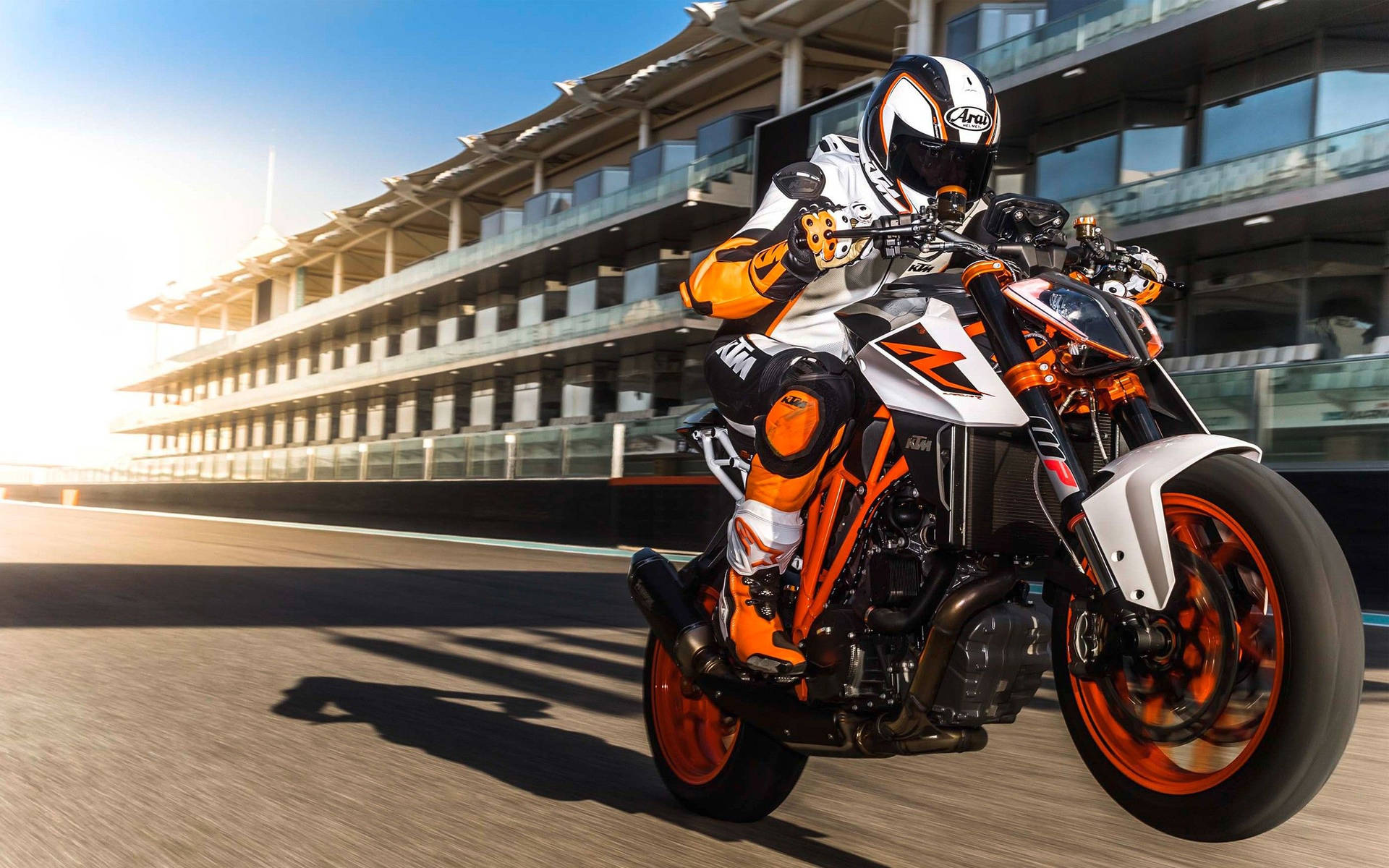Streaking Neon Orange Motorcycle Background