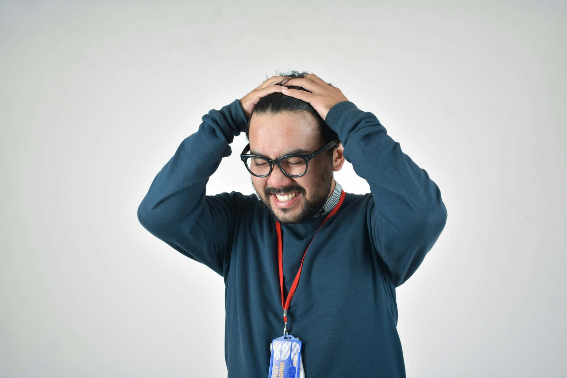 Stressed Man Grasping Head