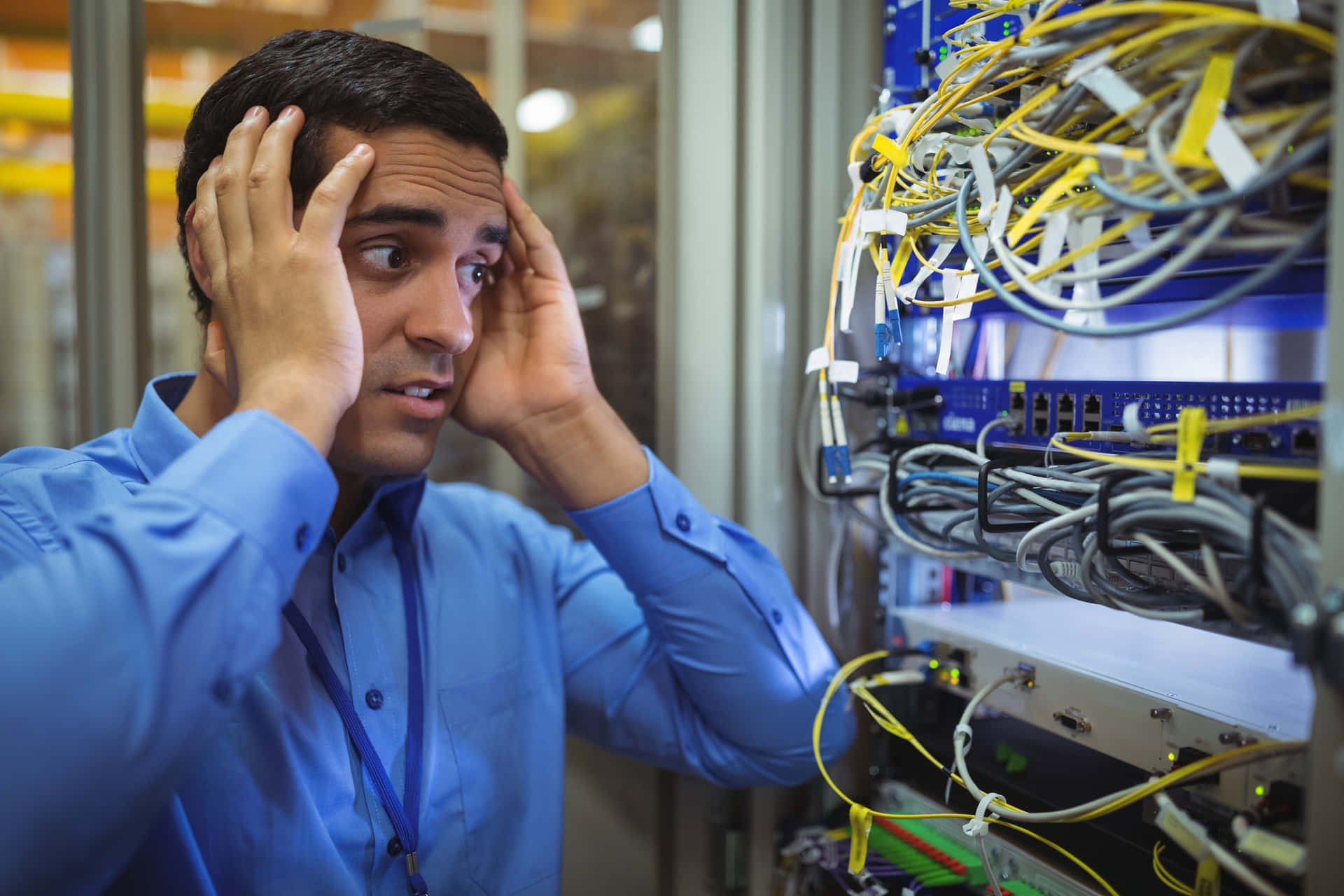 Stressed Technicianat Server Room Background