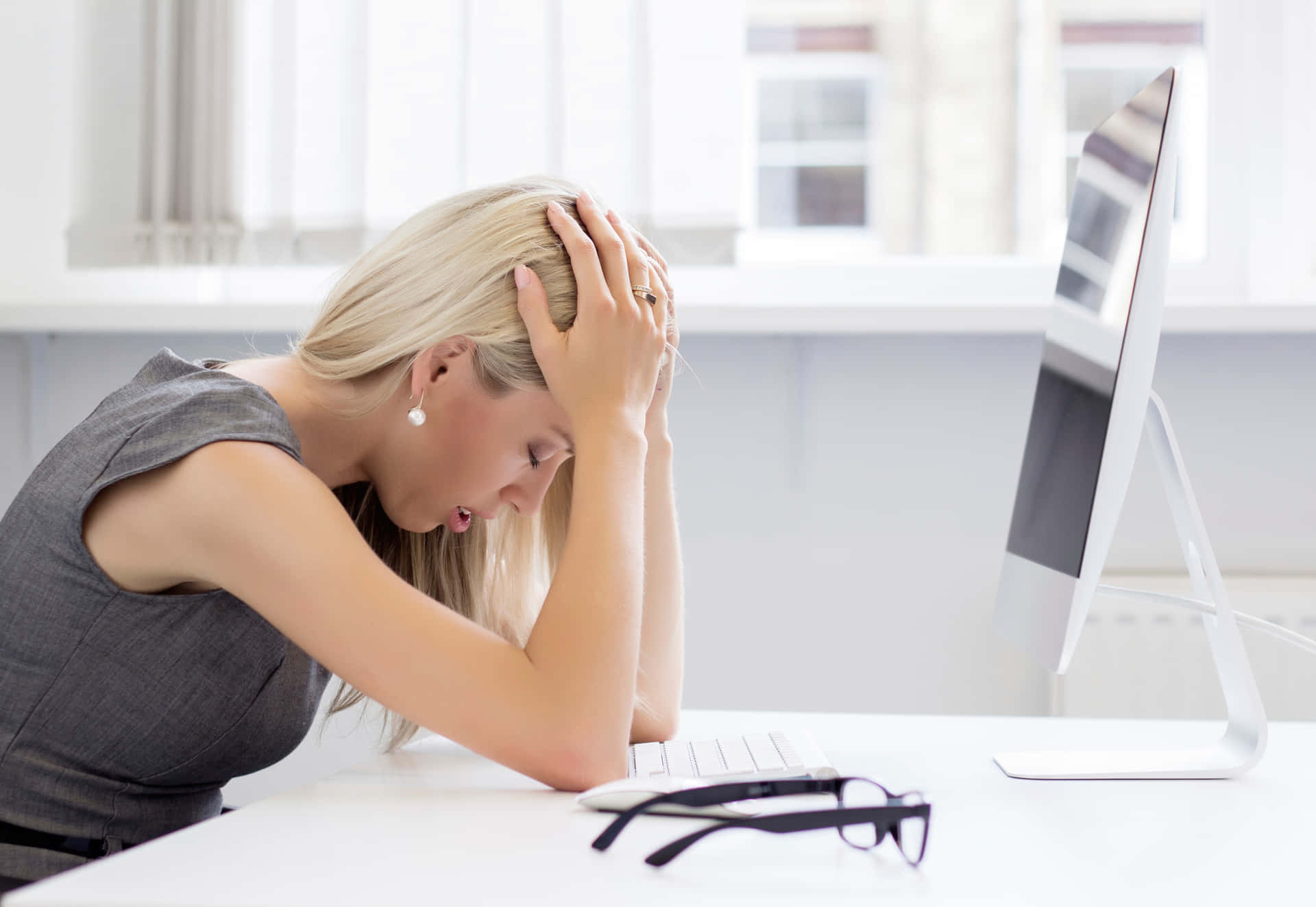 Stressed Womanat Desk.jpg Background