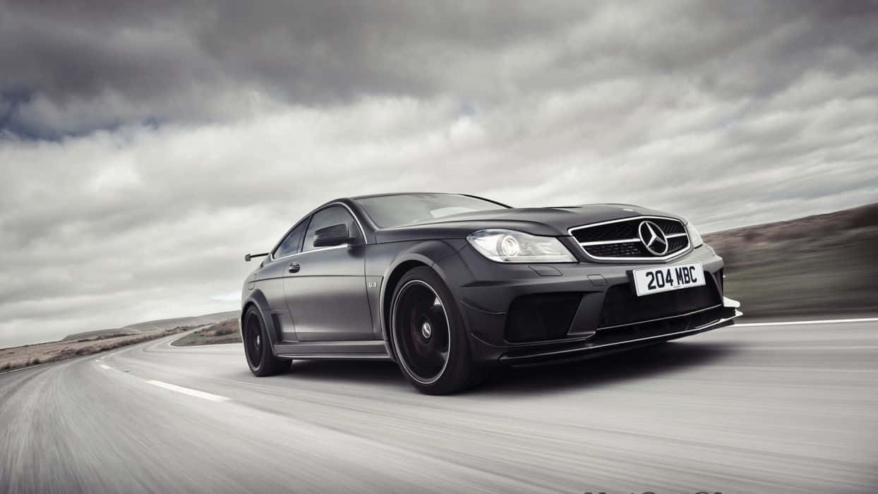 Striking And Stylish Mercedes-benz In Black Finish Background