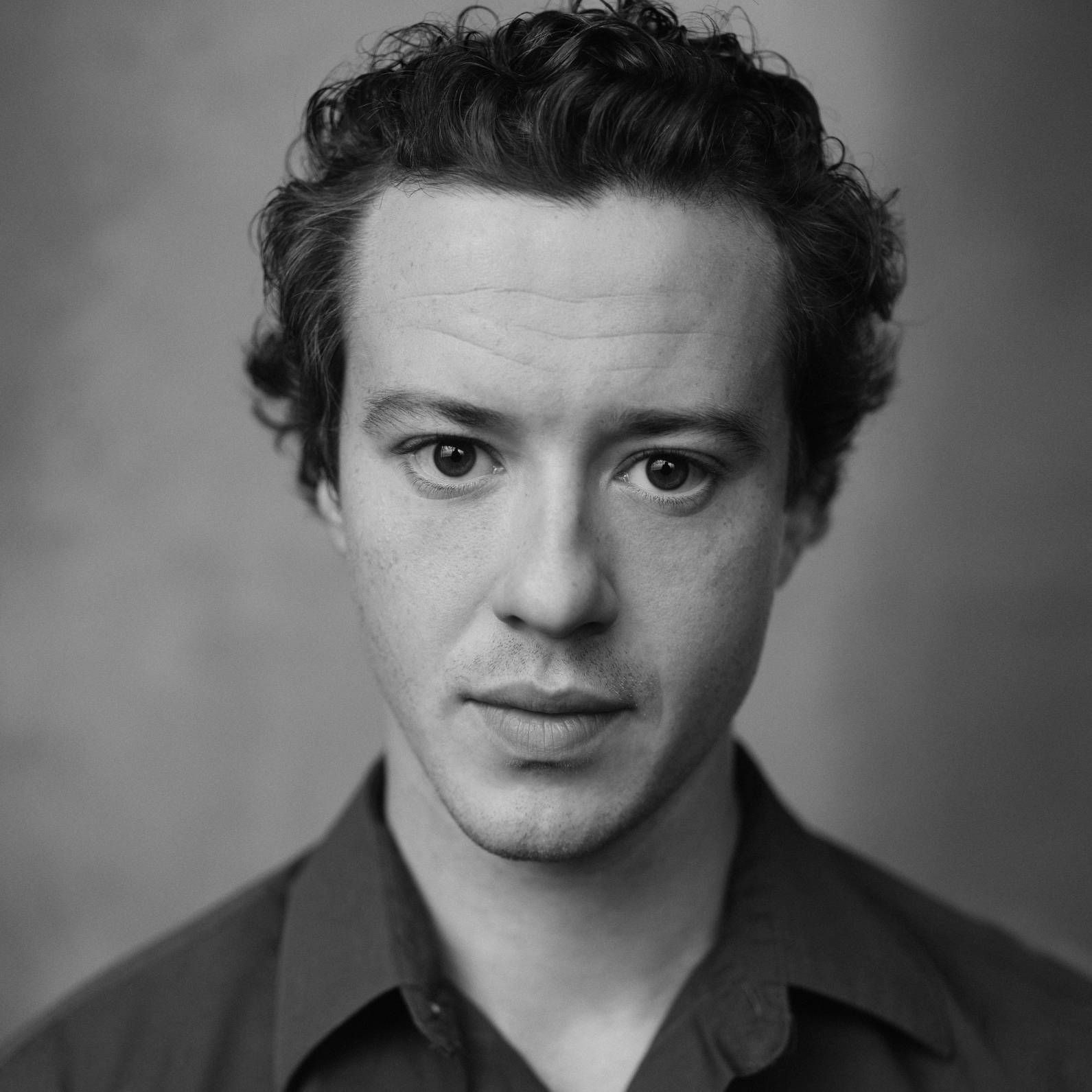 Striking Black And White Portrait Of Actor Joseph Quinn