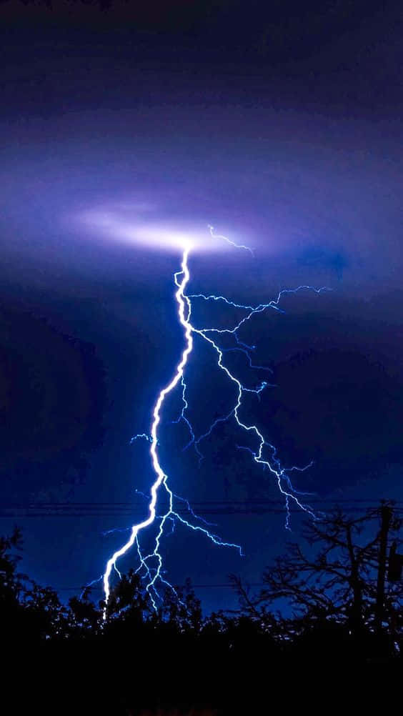 Striking Blue Lightning Streaks Across A Starry Night Sky Background