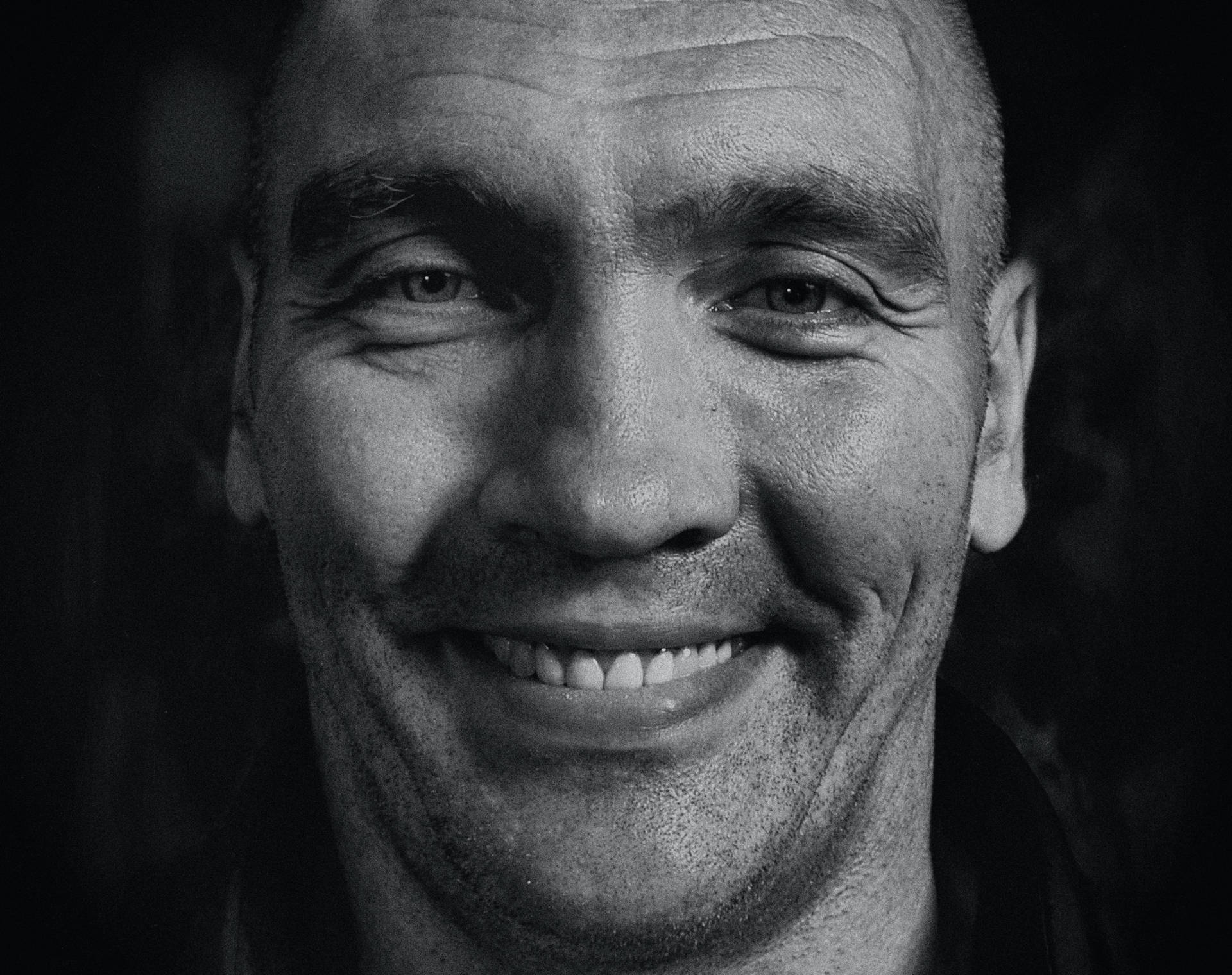 Striking Monochrome Headshot Of A Bald Man