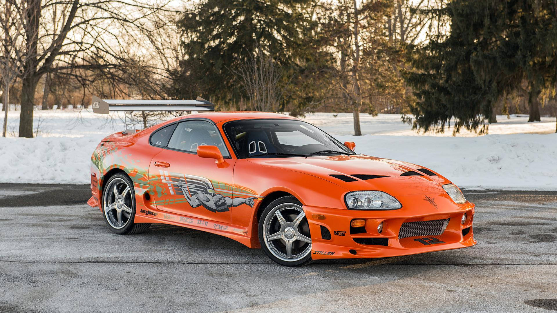 Striking Orange Toyota Supra Mk4 – Jewel From The Fast And The Furious Background