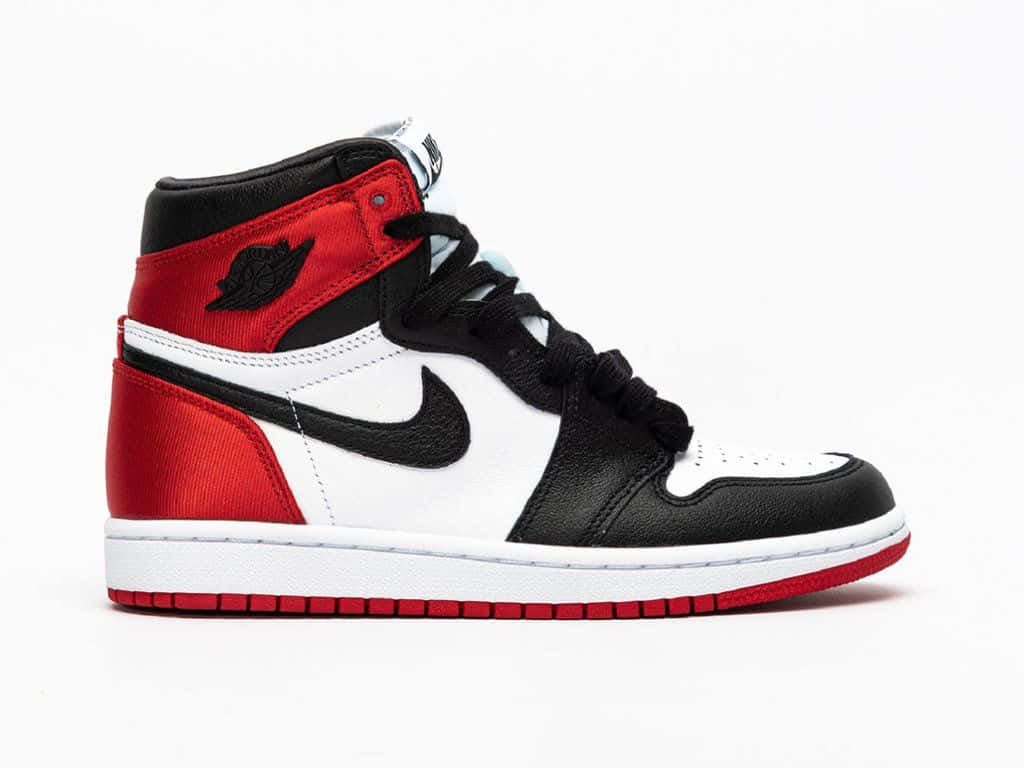 Striking Red Jordan Shoes Background