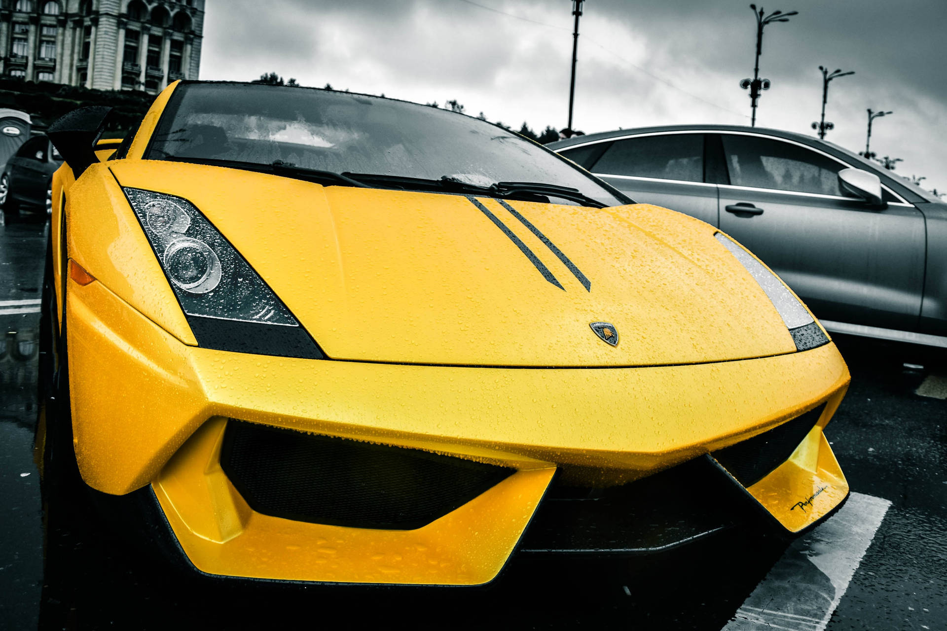“striking Yellow Lamborghini Gallardo On A Rainy Day” Background