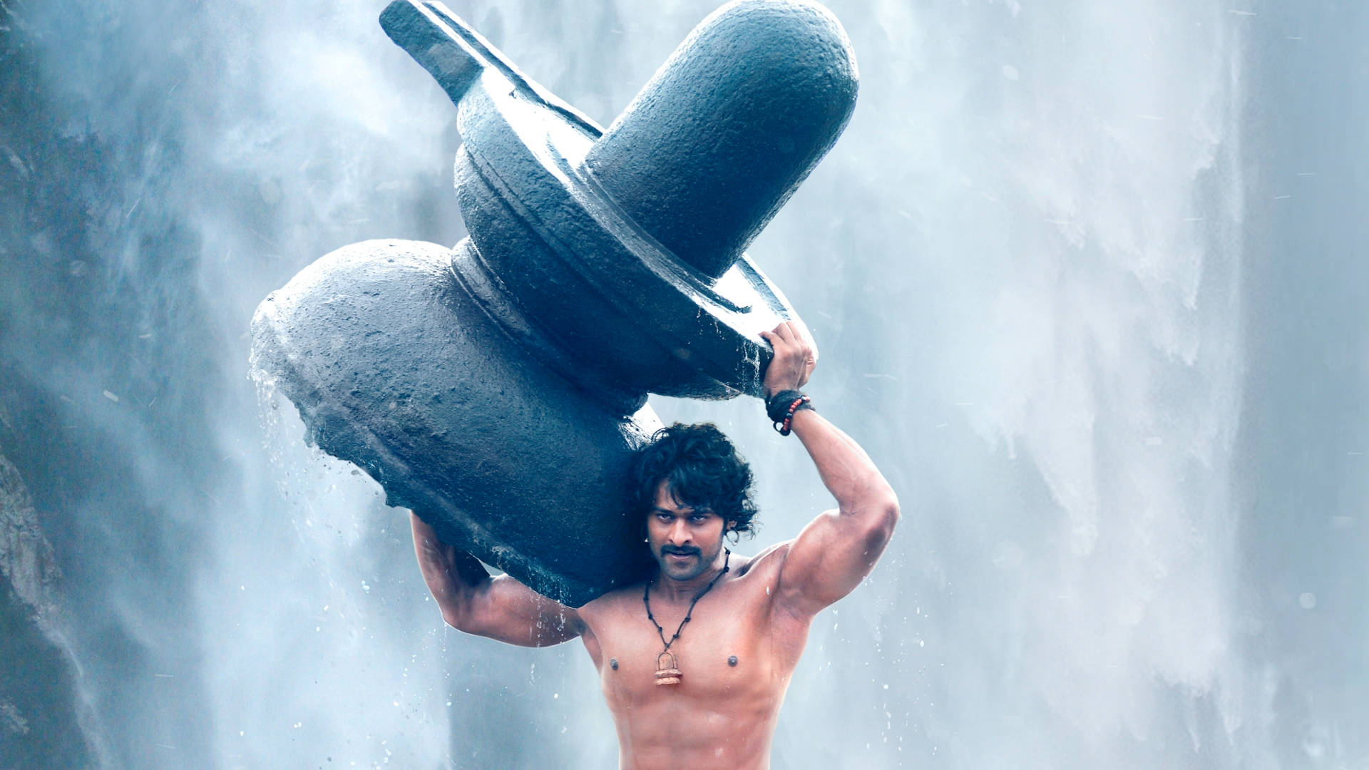 Strong Prabhas Carrying Stone Background
