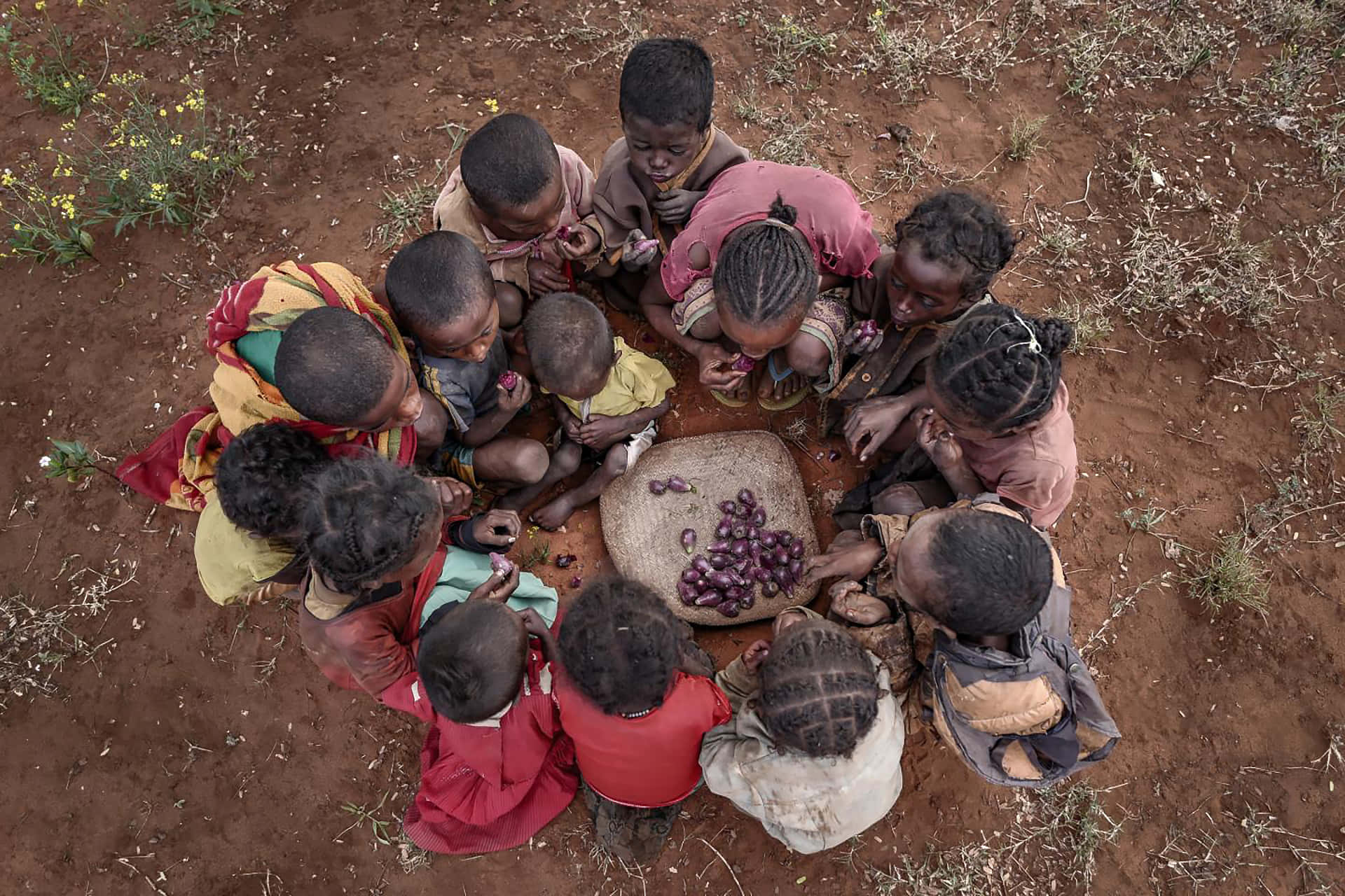 Struggling Children Eating In Madagascar
