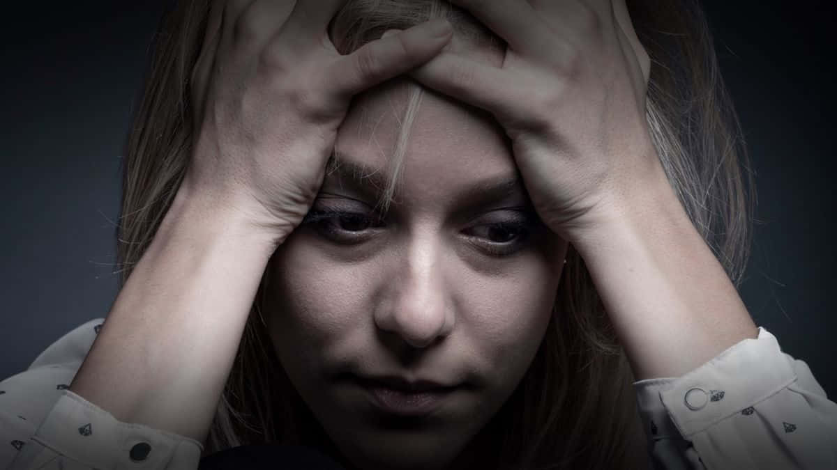 Struggling Woman Contemplating Late-term Abortion Background