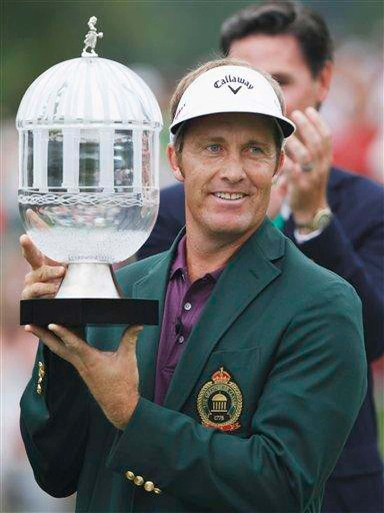 Stuart Appleby Holding A Glass Trophy Background